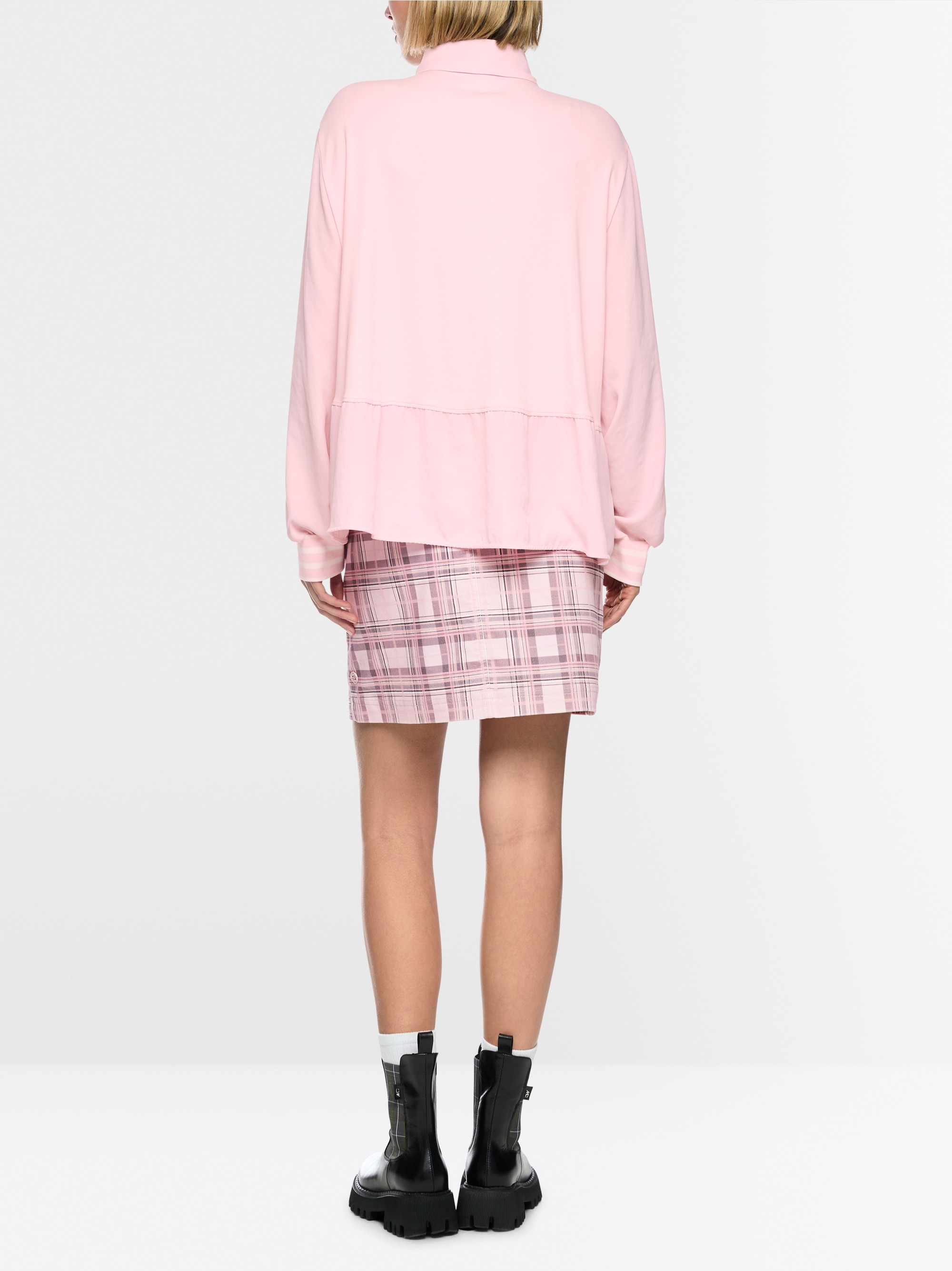 Blouse with polo collar and flounce