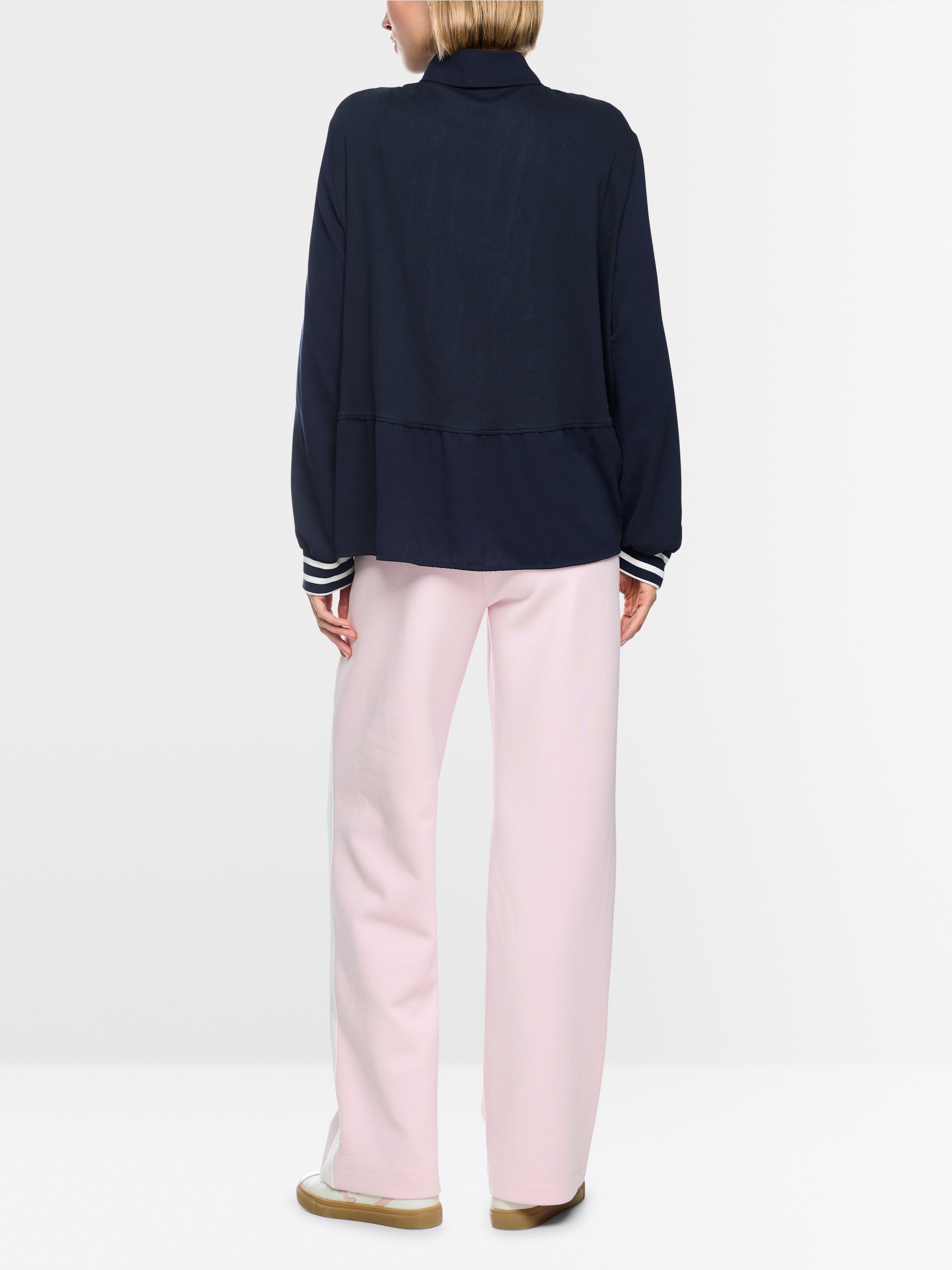 Blouse with polo collar and flounce