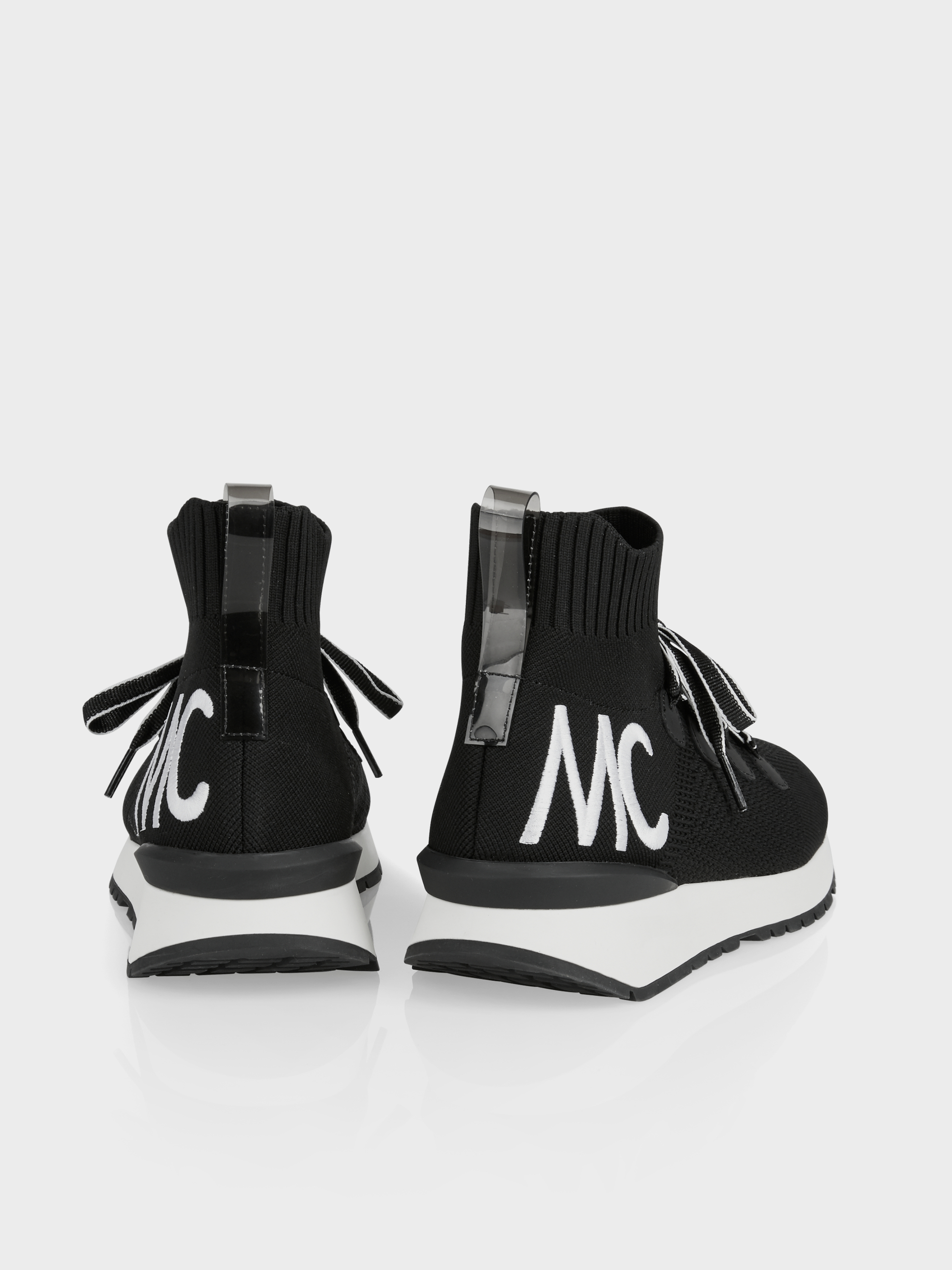 black knitted trainers