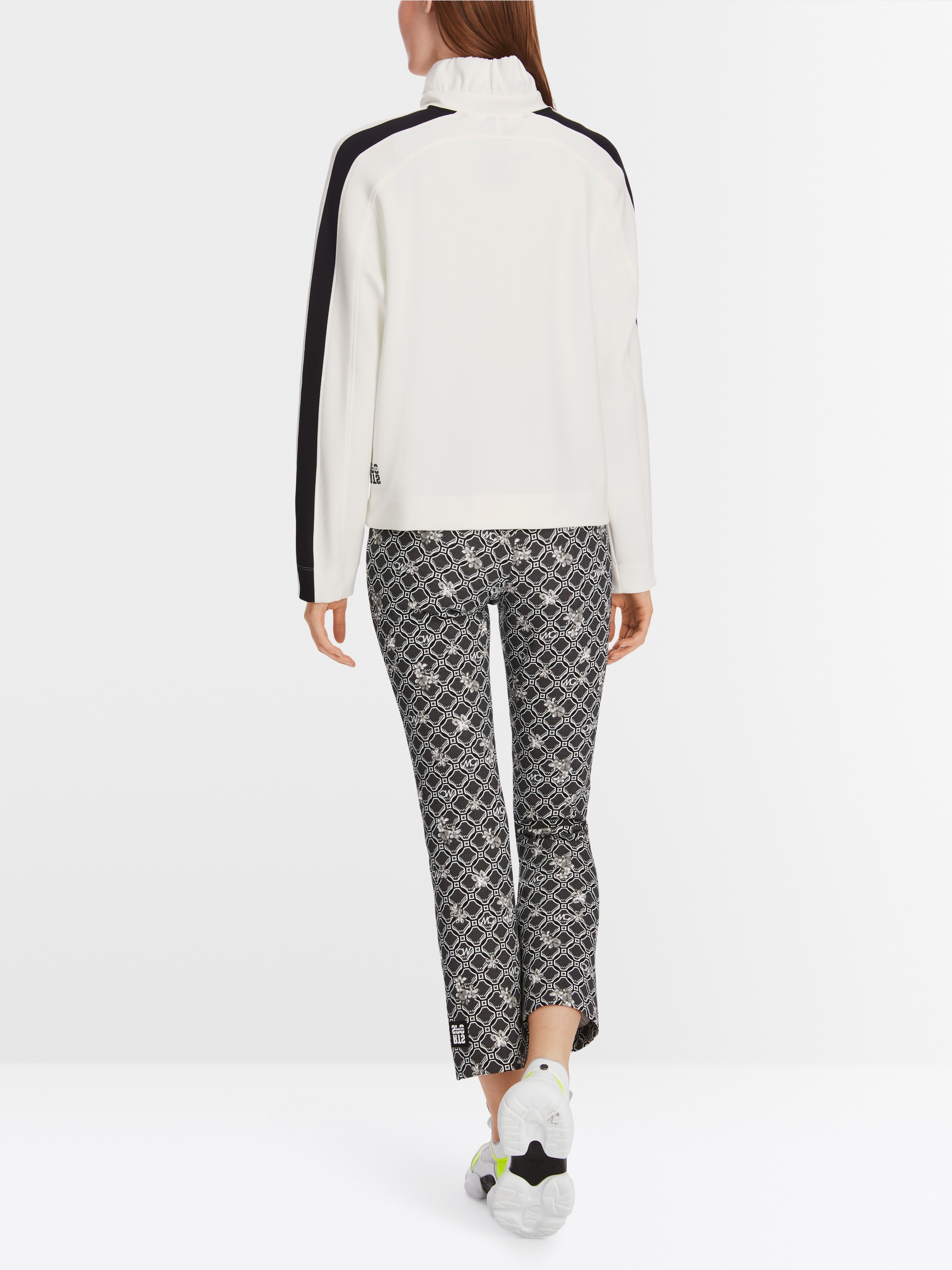 Veste zippée avec col à volants