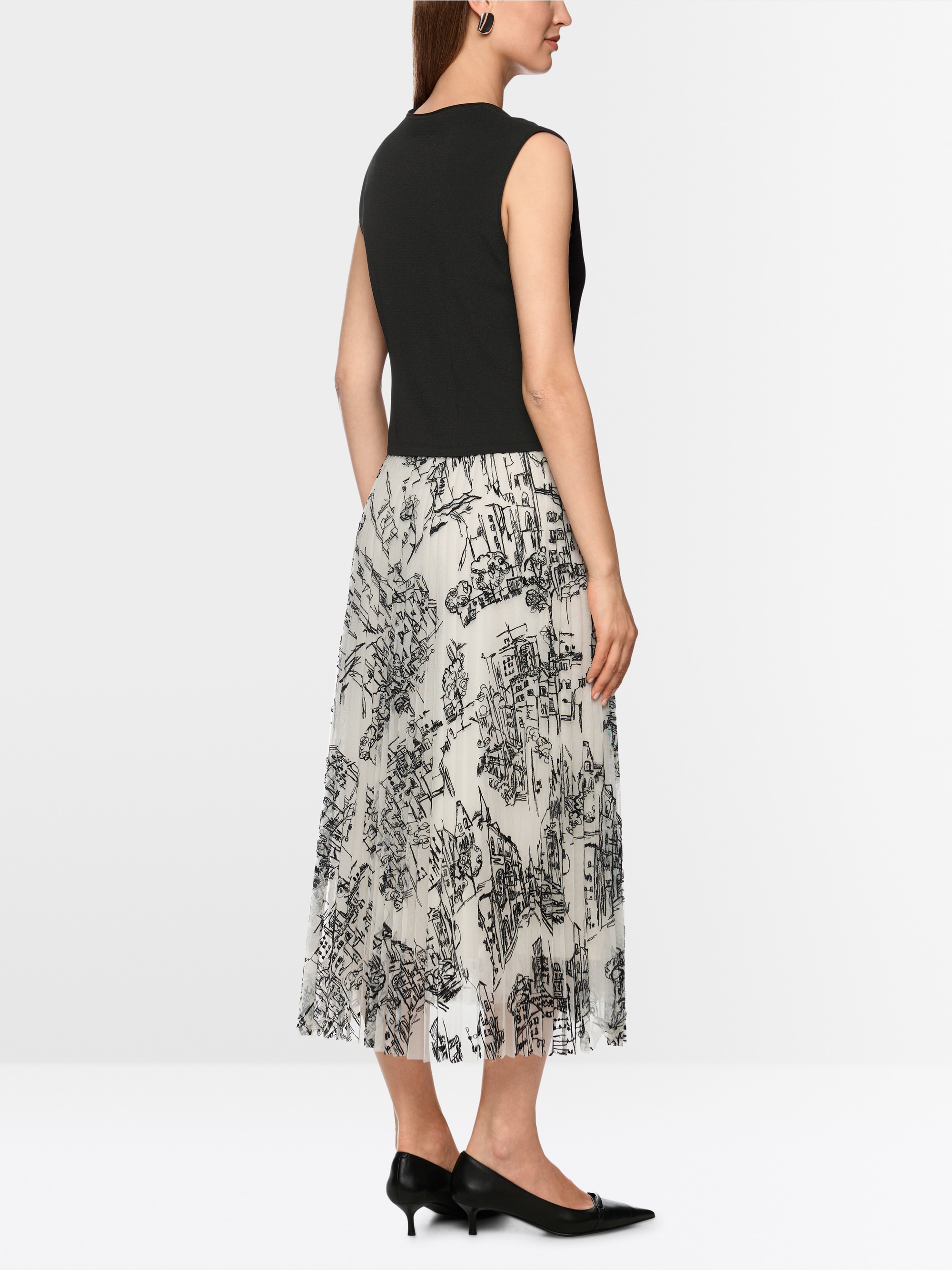 Getailleerd gebreid vest “Rethink Together”