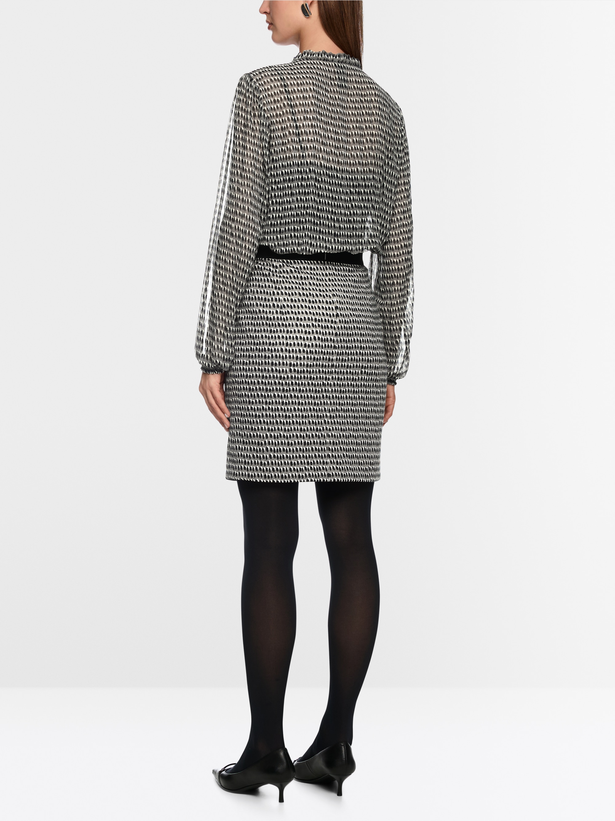 Semi-transparent blouse with ruffles