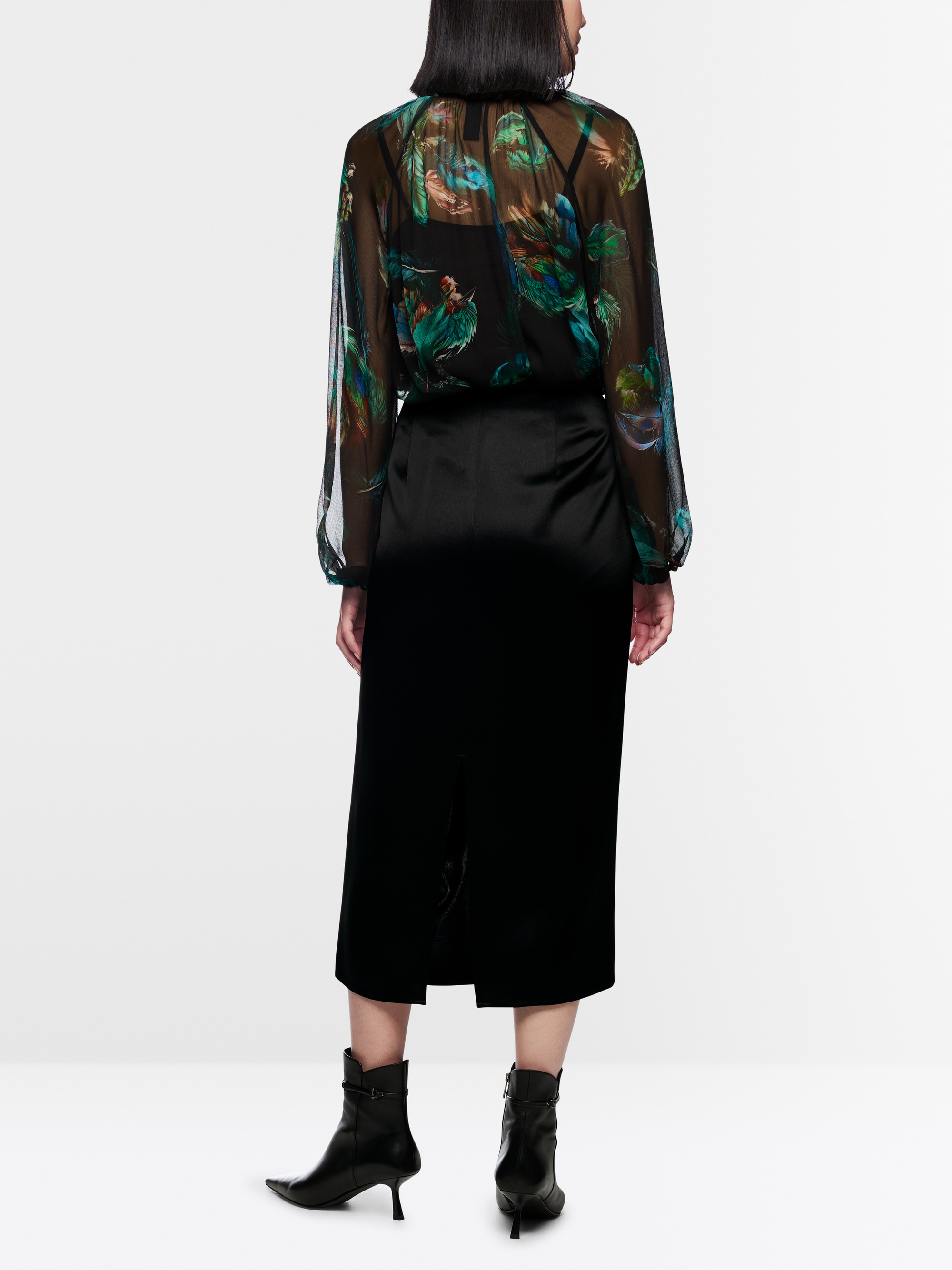 Calf-length skirt with draping