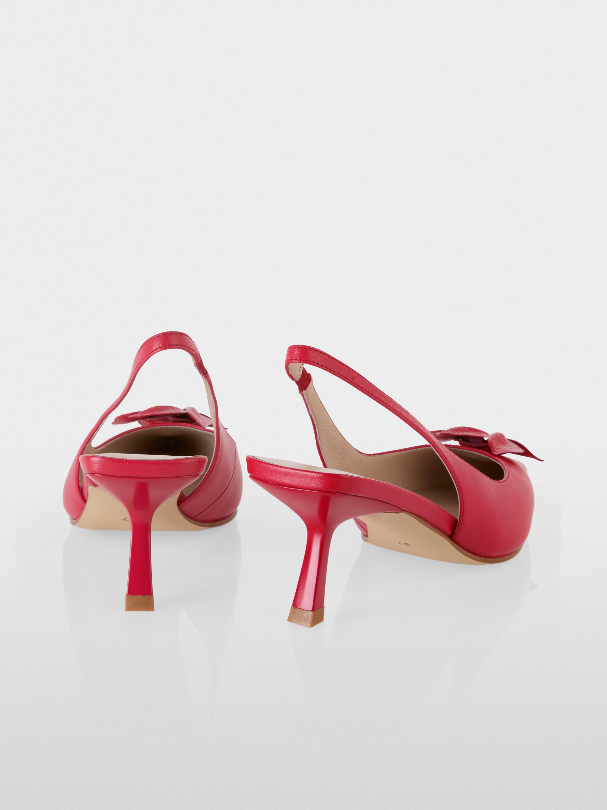 Slingback pumps in calf leather