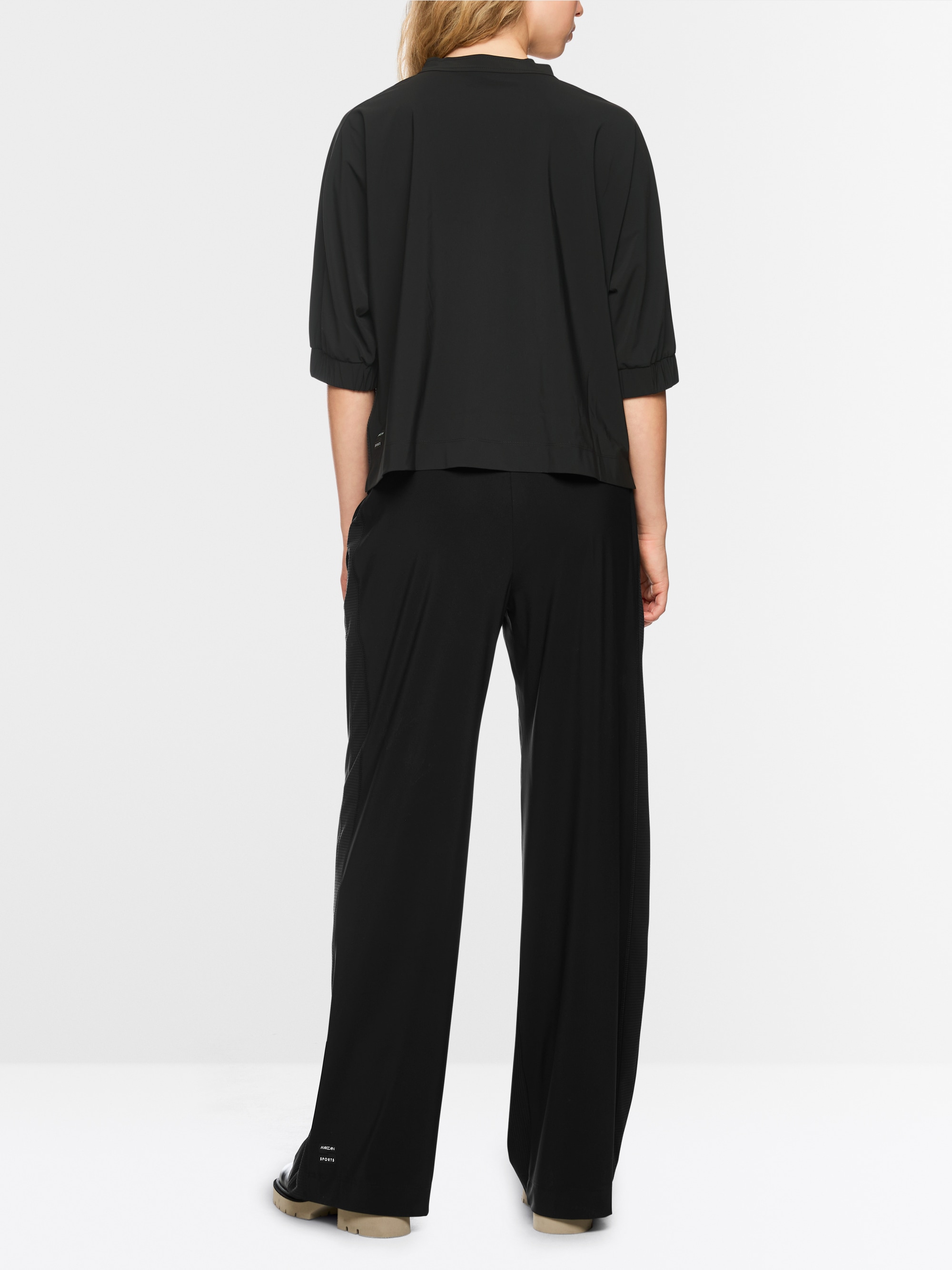 Shirt met strik ”Rethink Together”