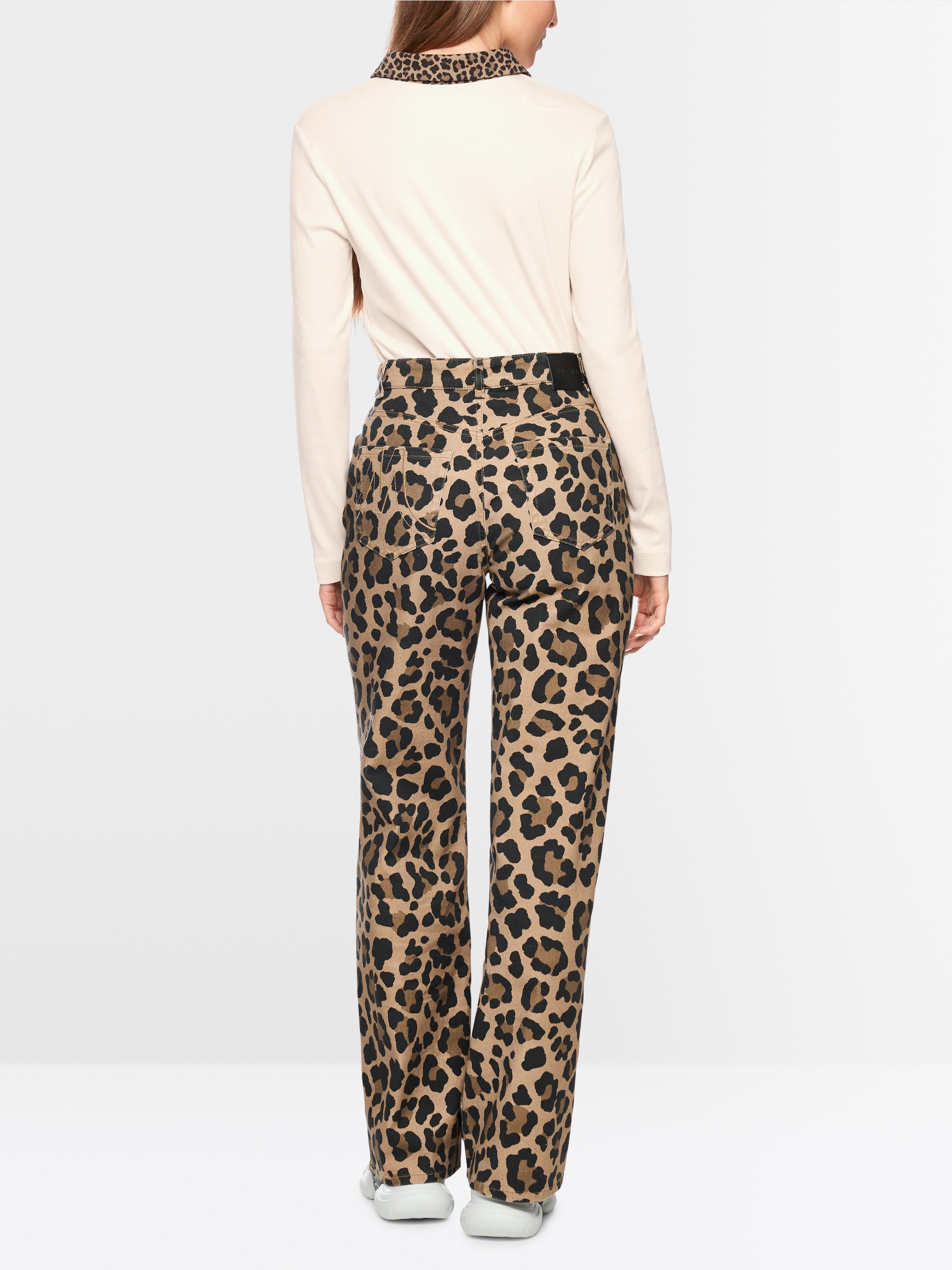 Plain polo shirt with leopard details