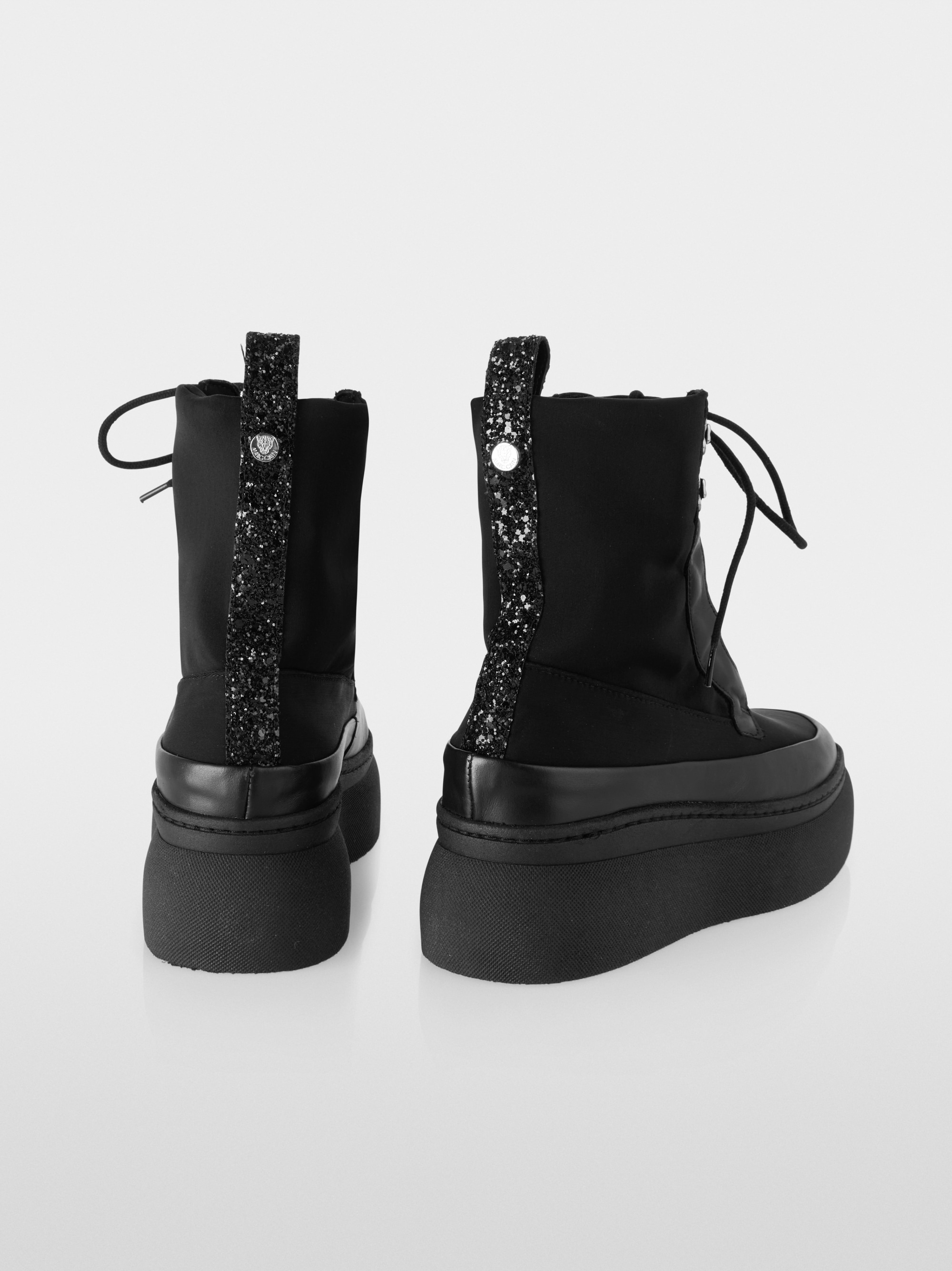 Bottines à lacets avec semelle compensée