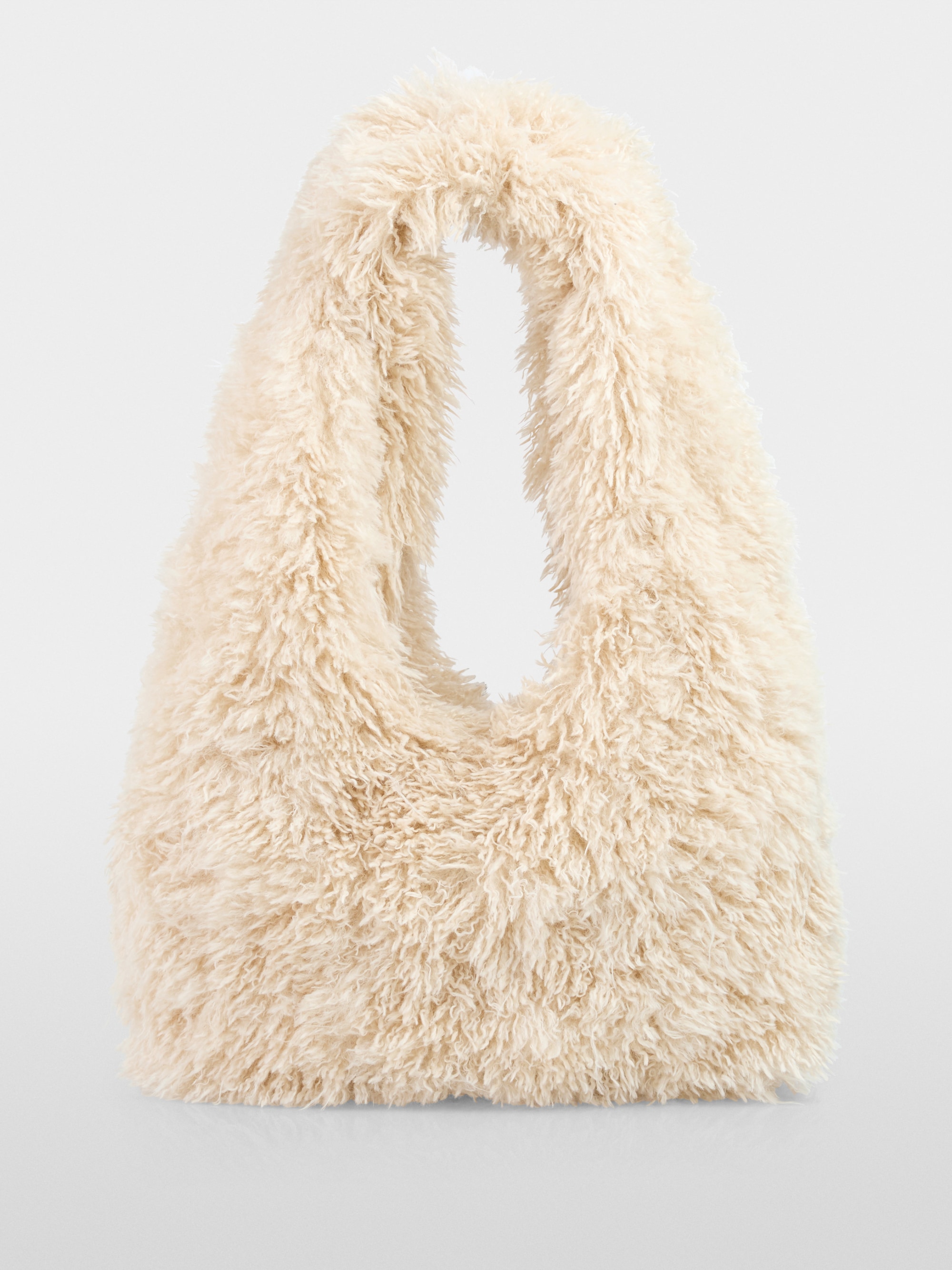 Shoulder bag in dog fur look