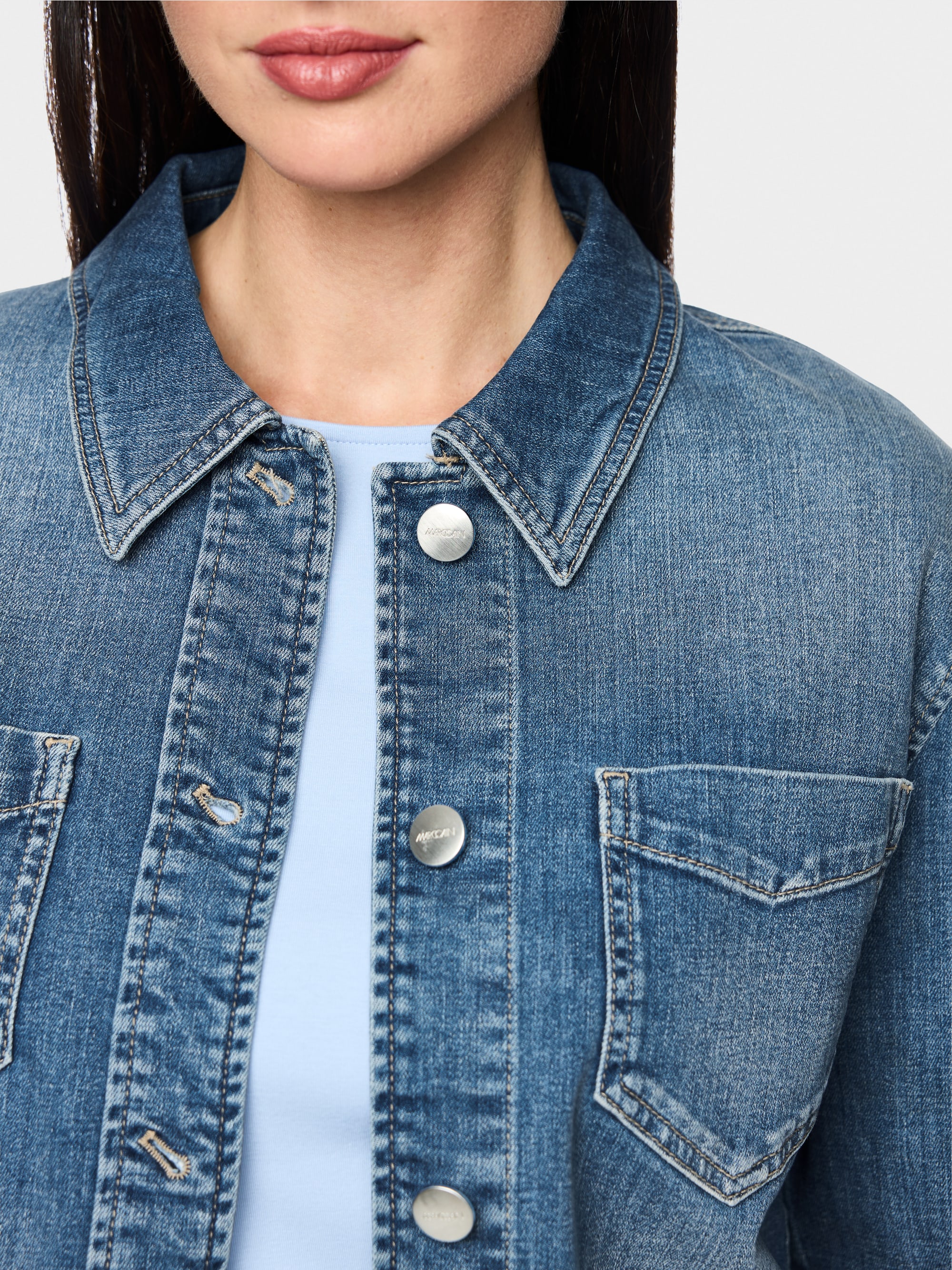 Denim jacket with floral print sleeves