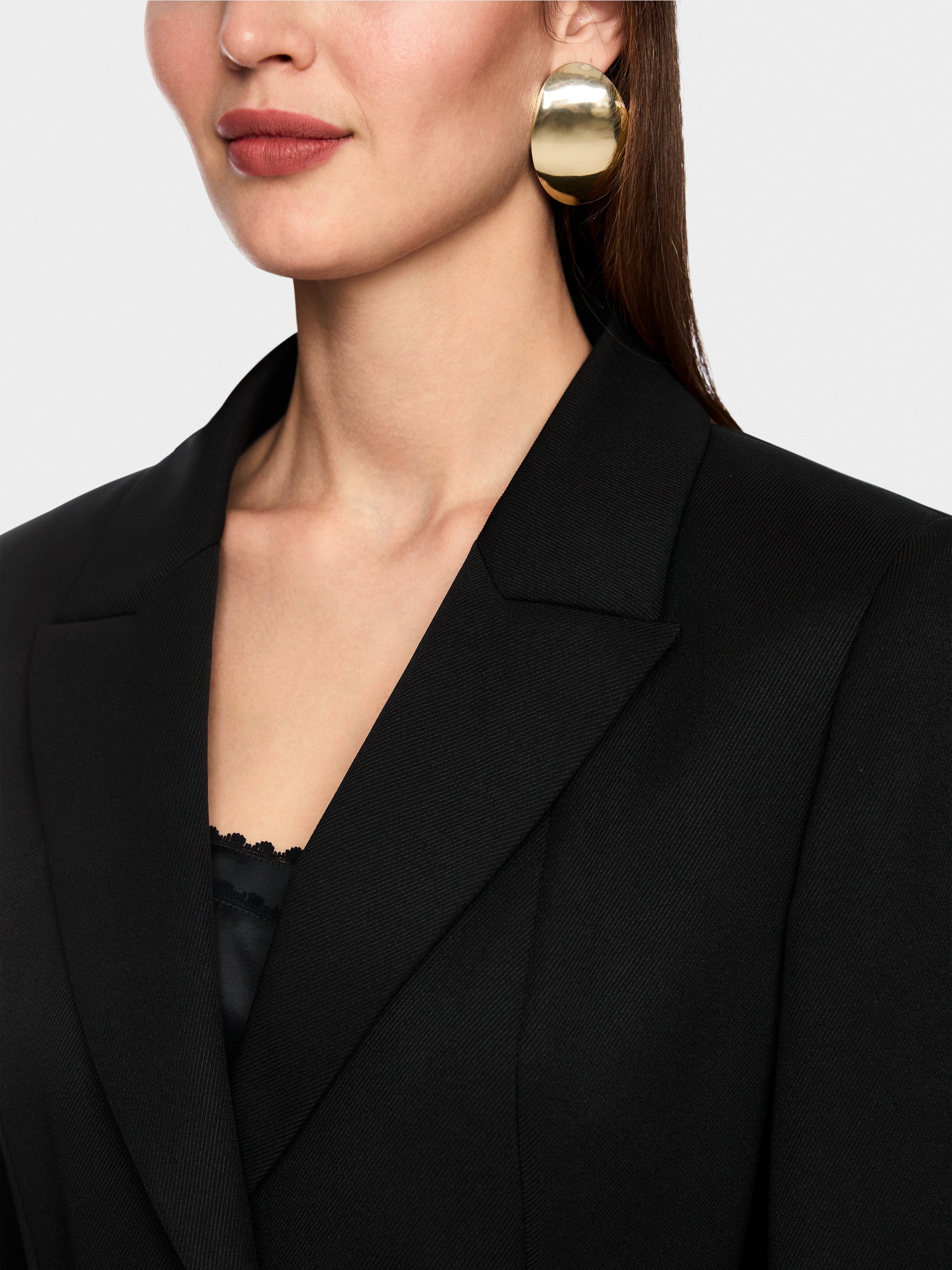 Elegant blazer with waist belt