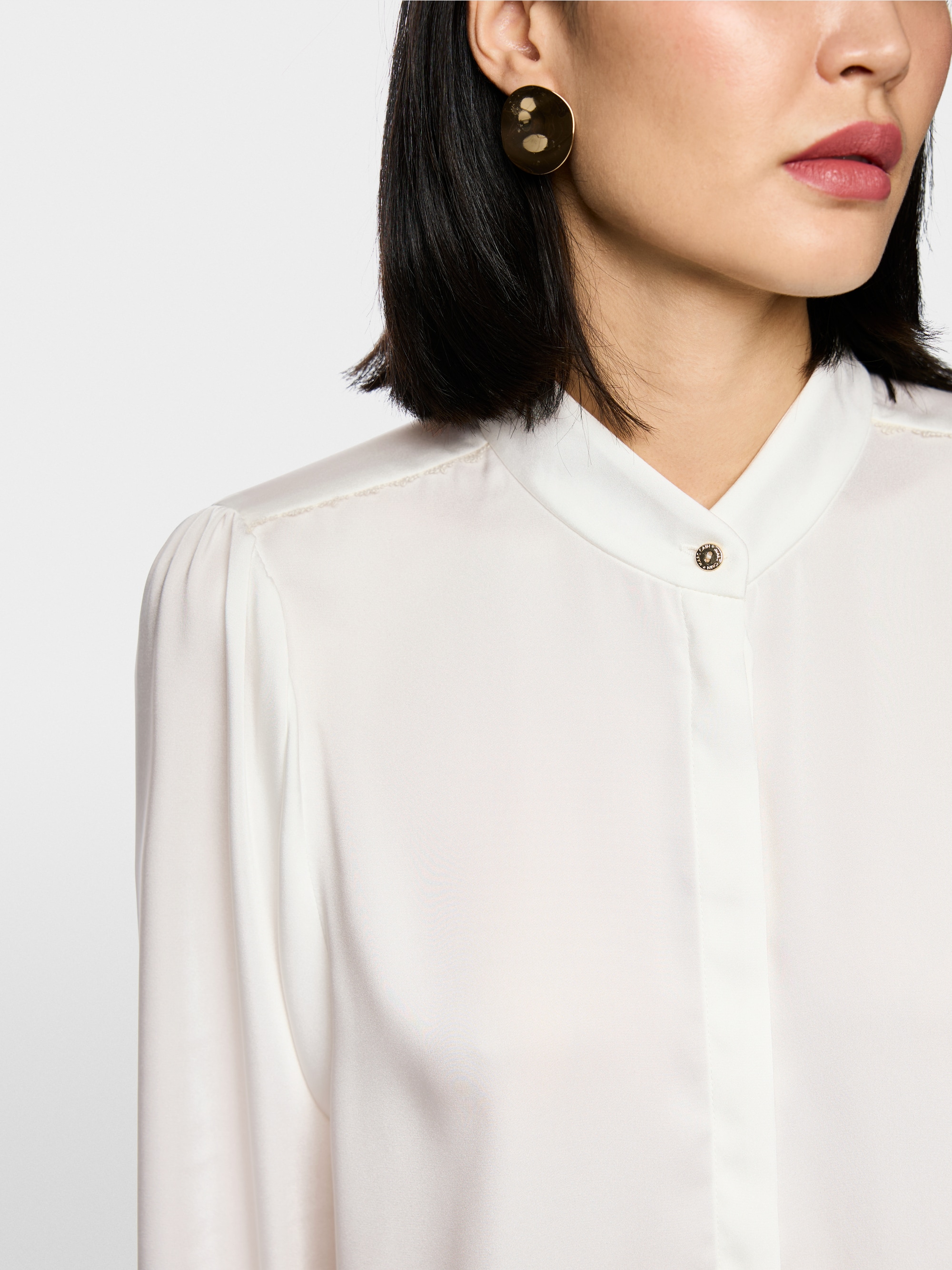 Blouse with lace and stand-up collar