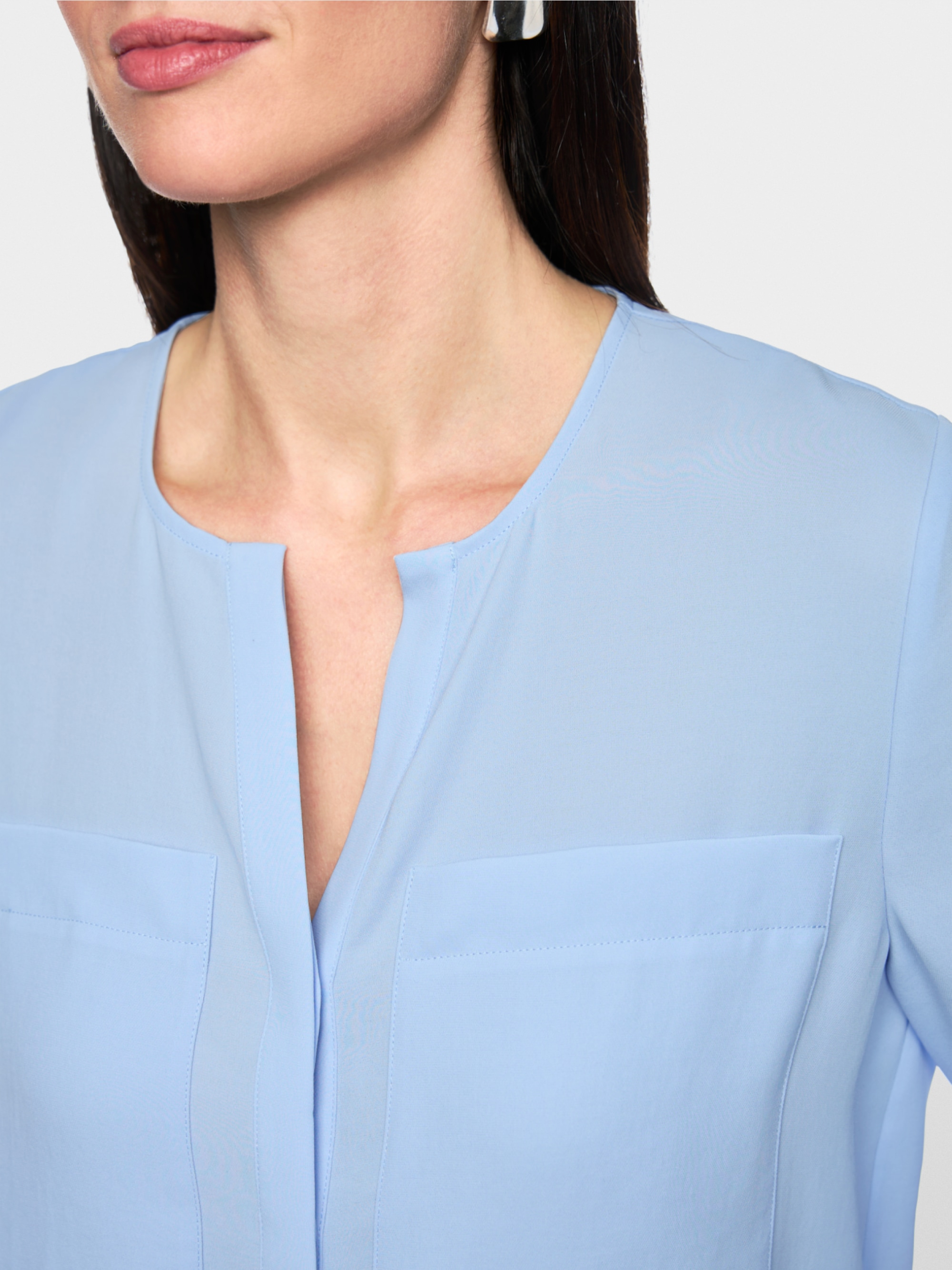 Casual blouse with concealed buttoning
