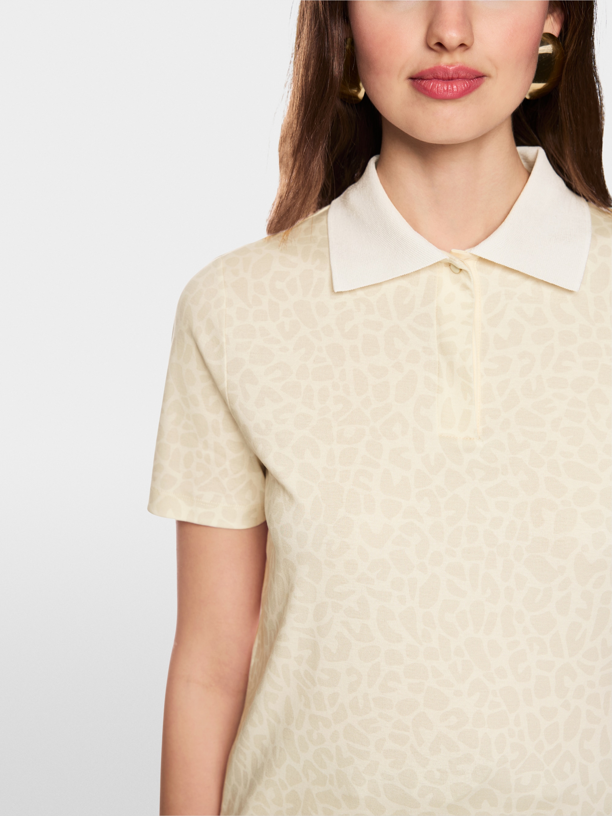 Polo shirt with leopard pattern