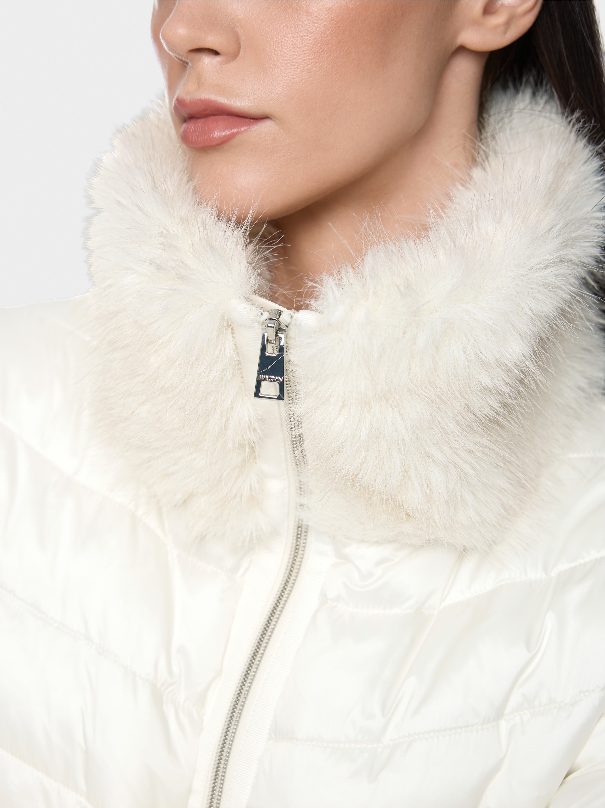 Quilted jacket with faux fur