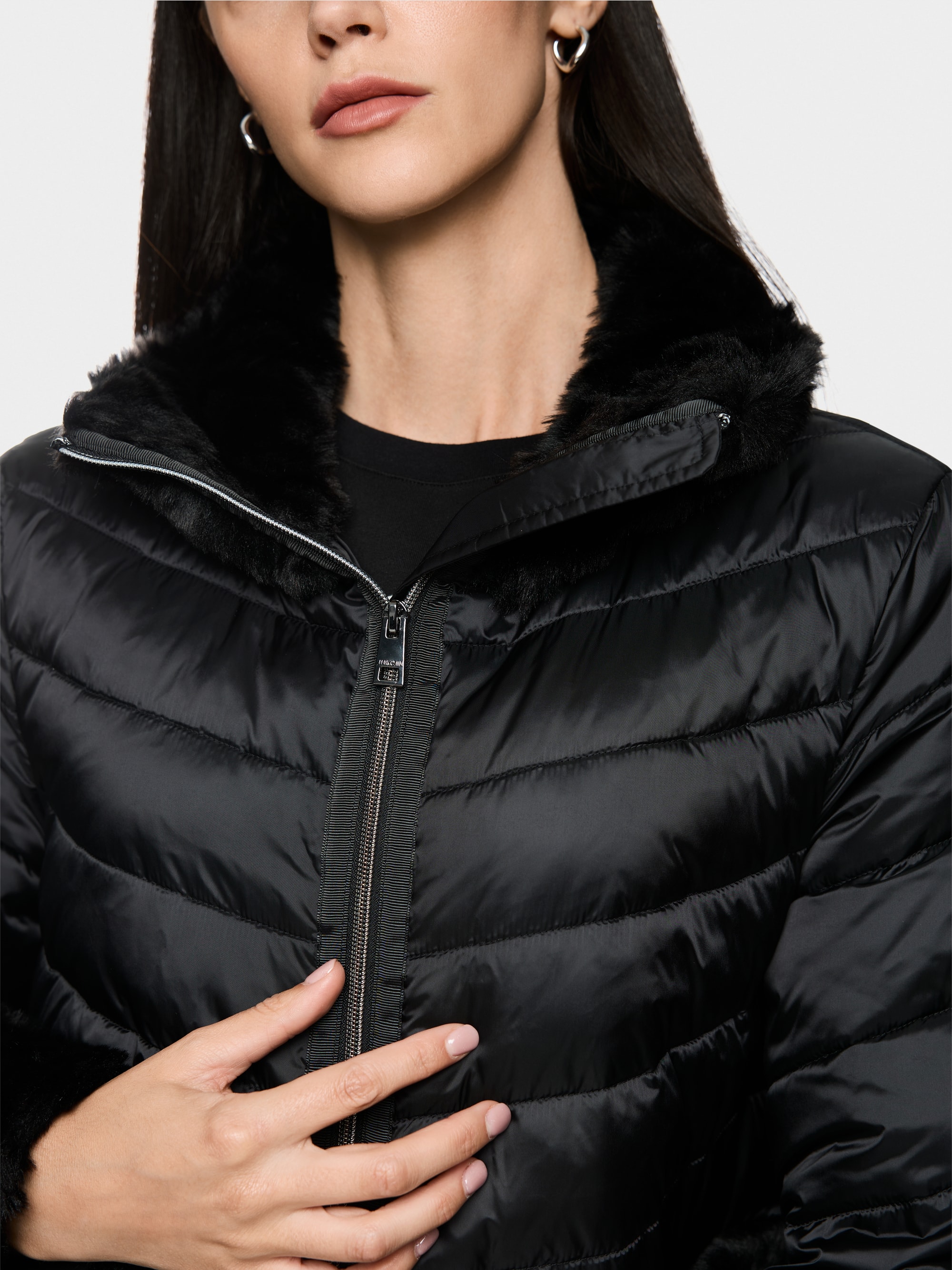 Quilted jacket with faux fur