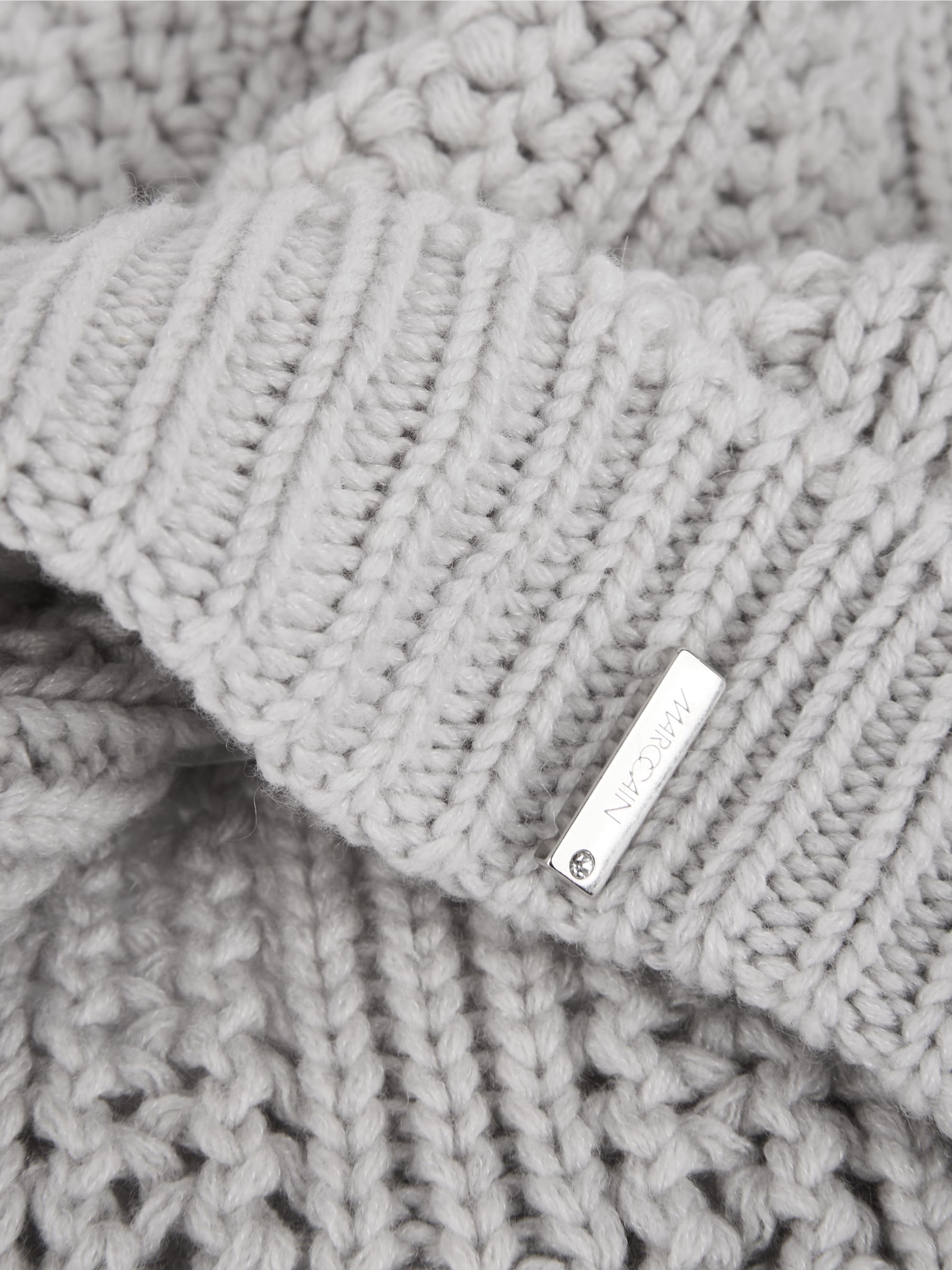 ‘Knitted in Germany’ pom-pom hat