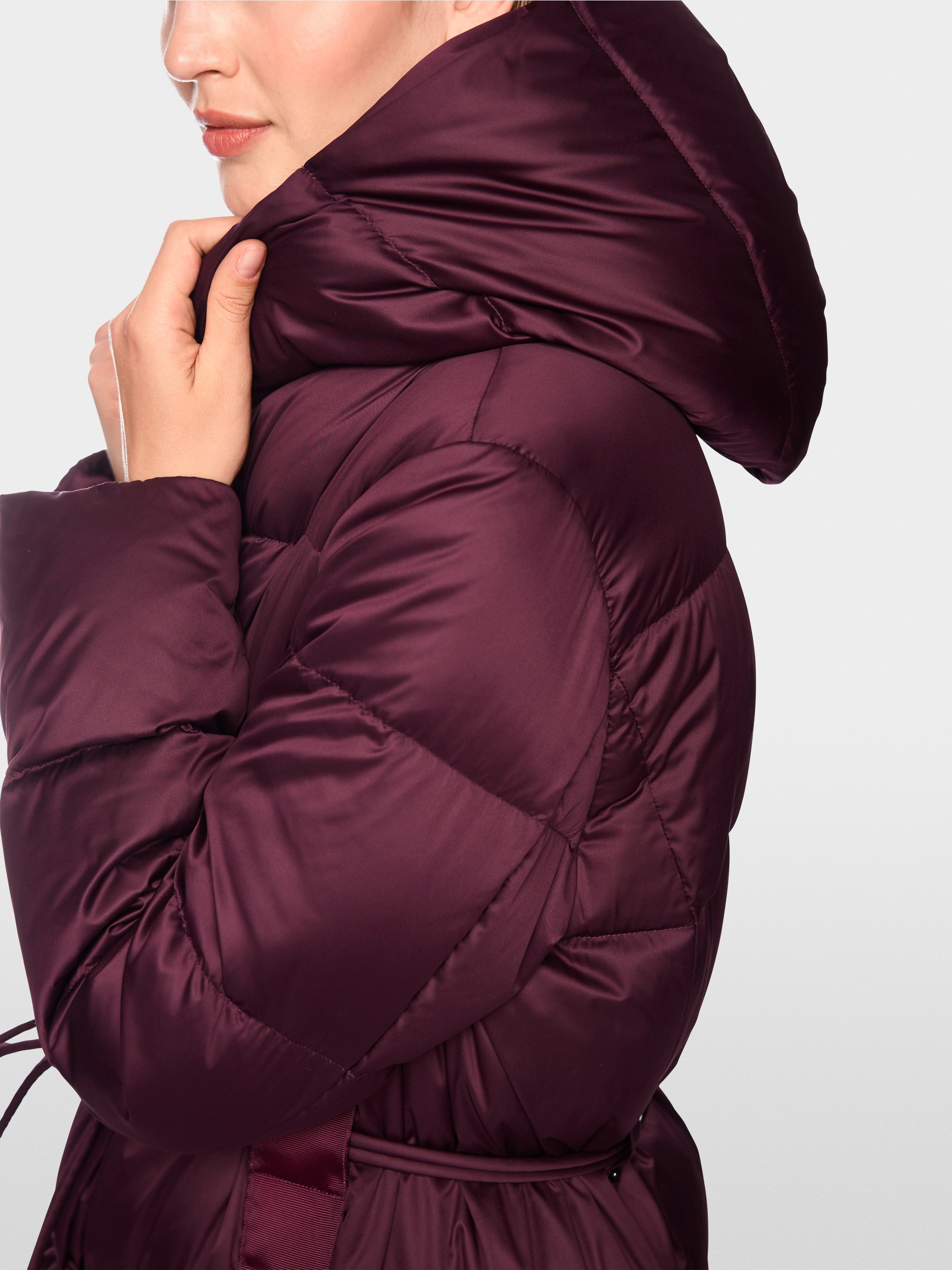 Manteau long en duvet à capuche
