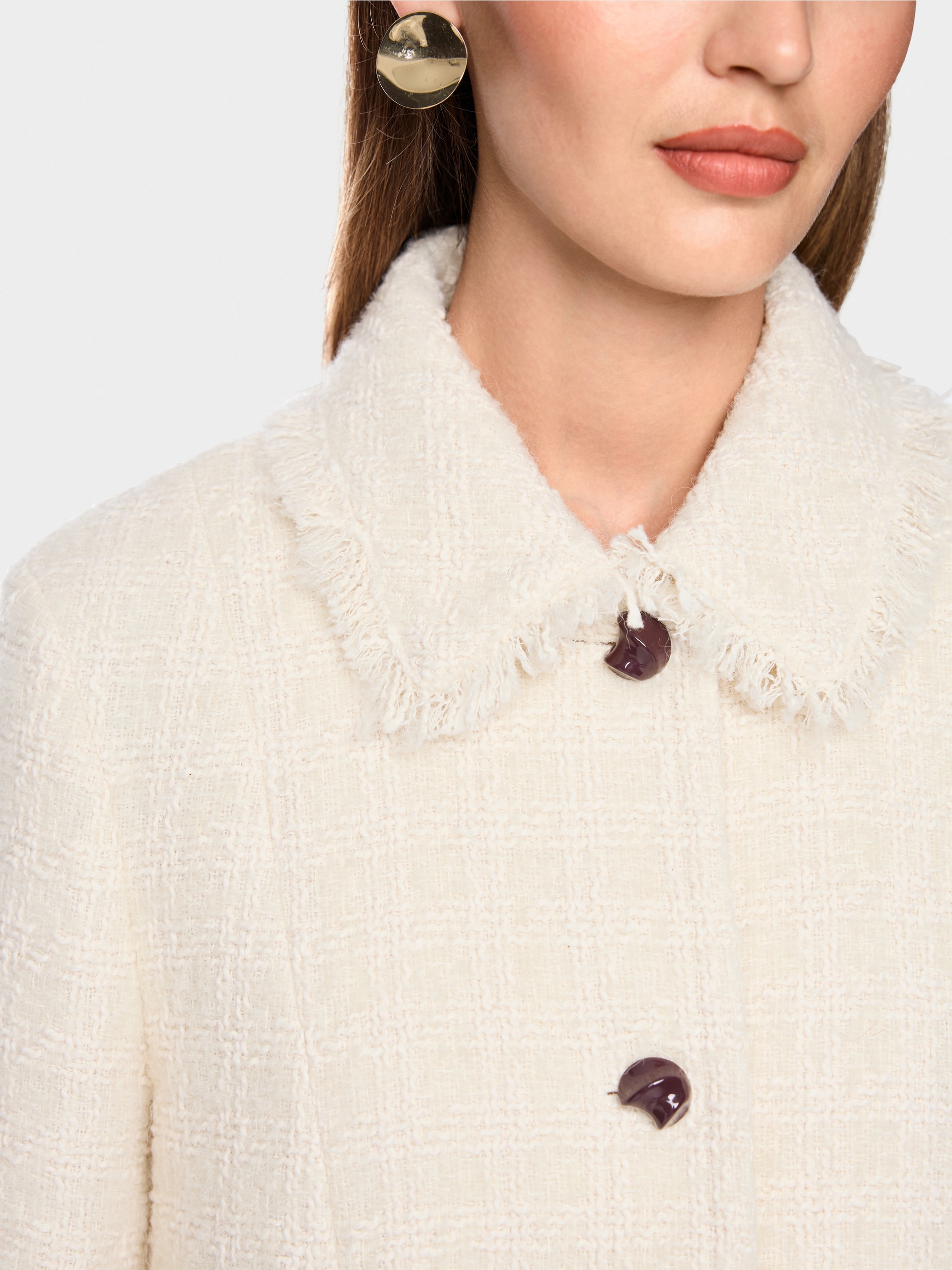 Bouclé jacket with fringing
