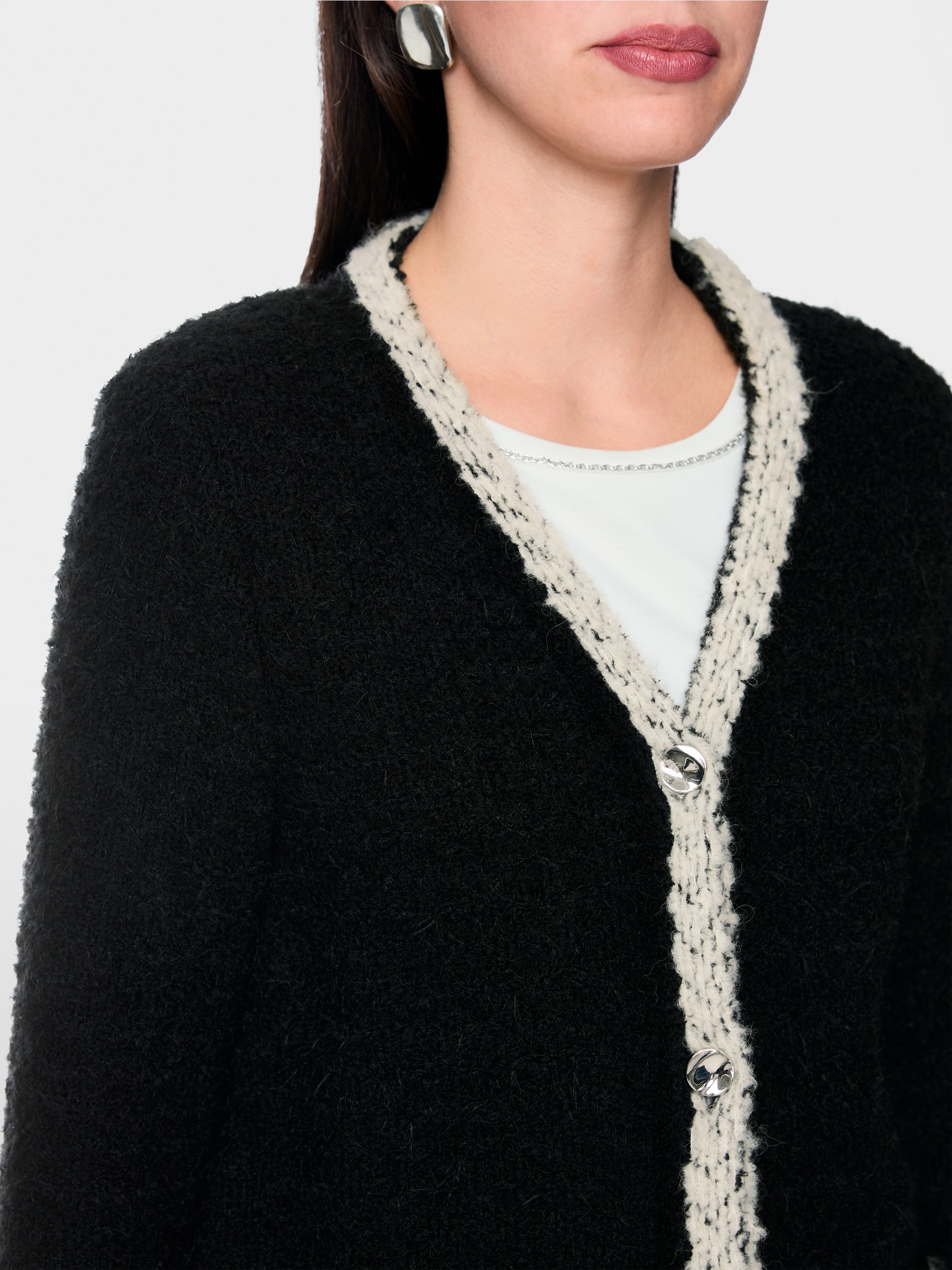Cardigan bouclé tricoté en Allemagne