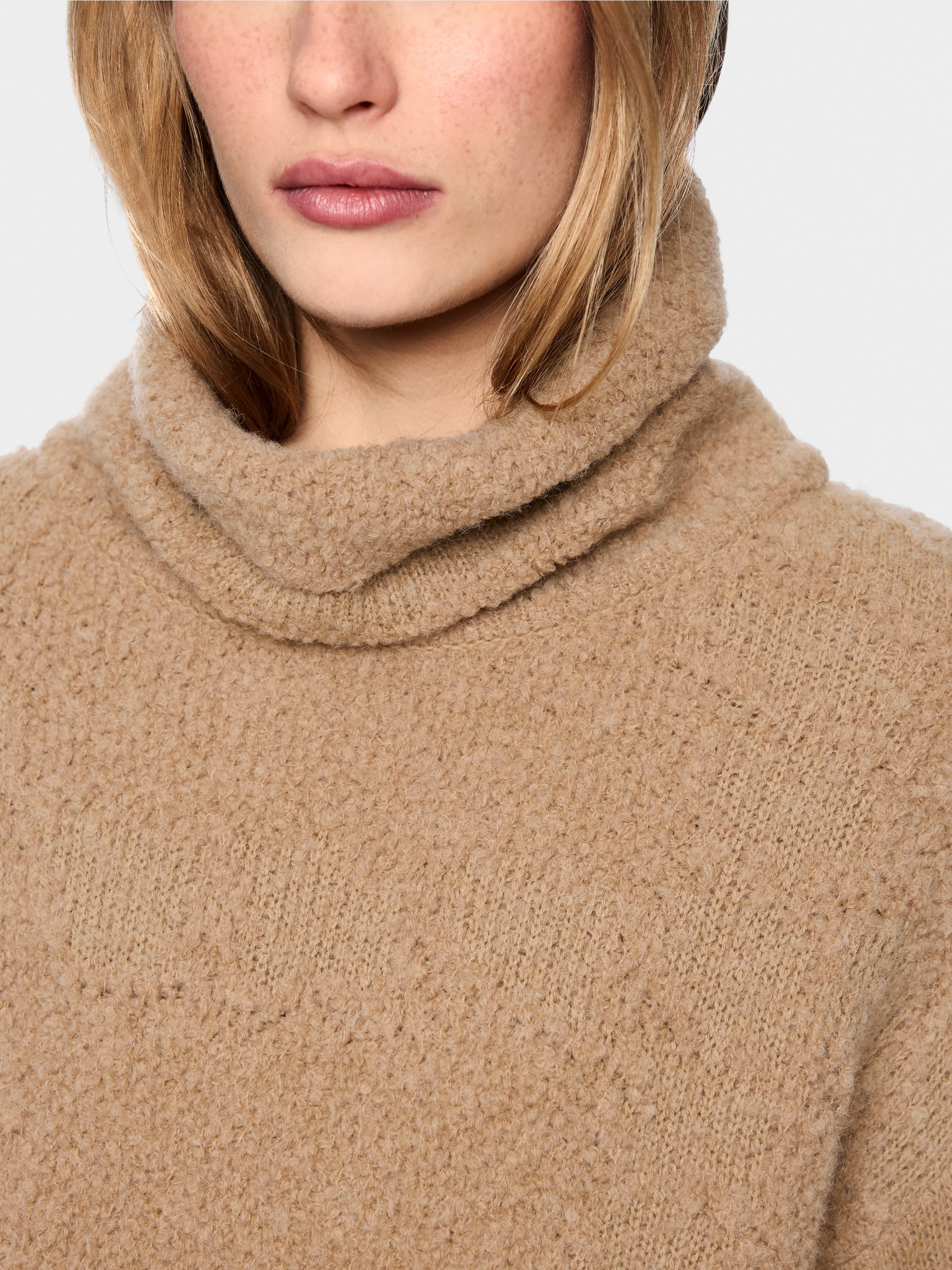 ‘Knitted in Germany’ turtleneck jumper