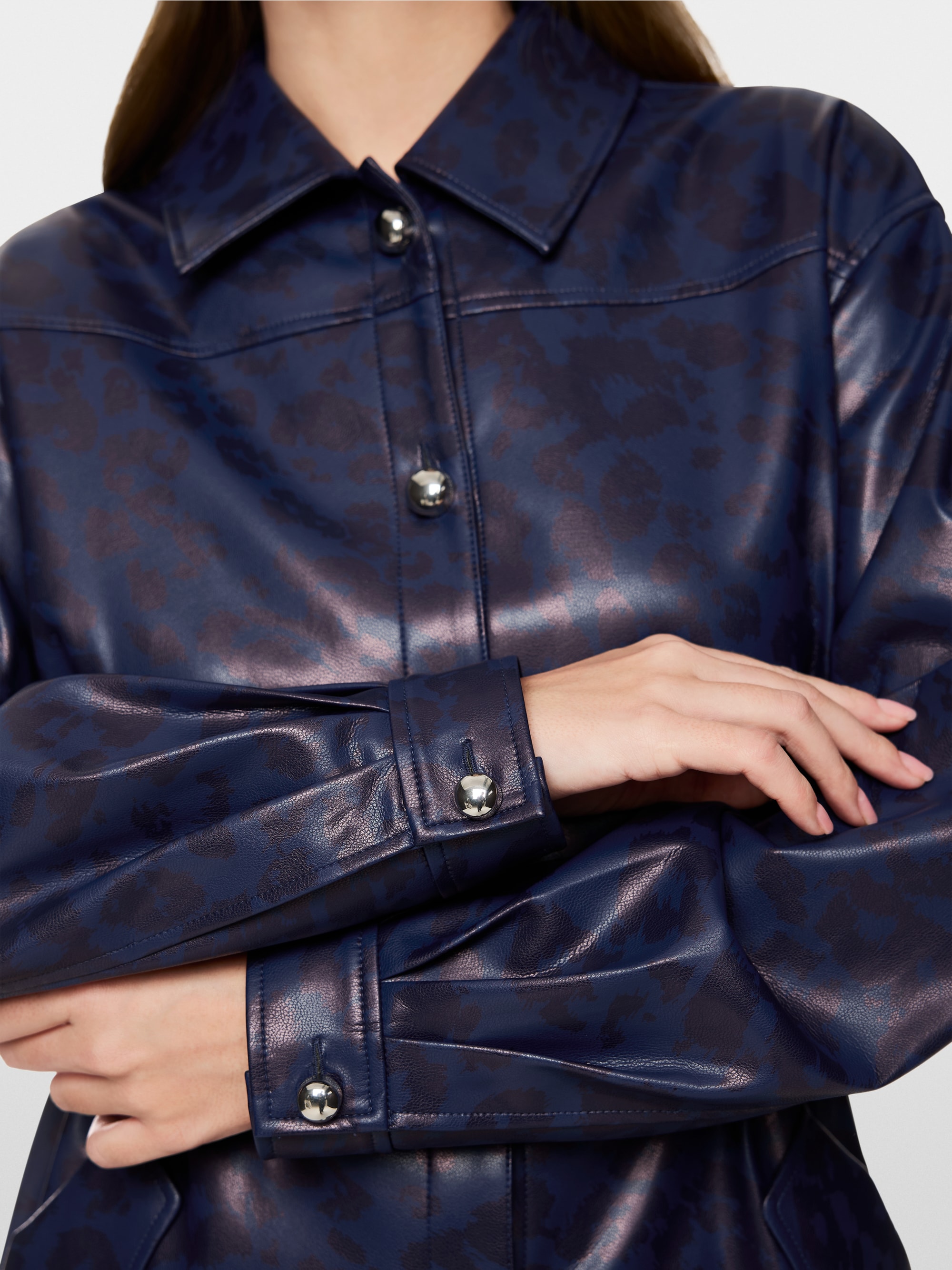 Faux leather blouse with leopard print