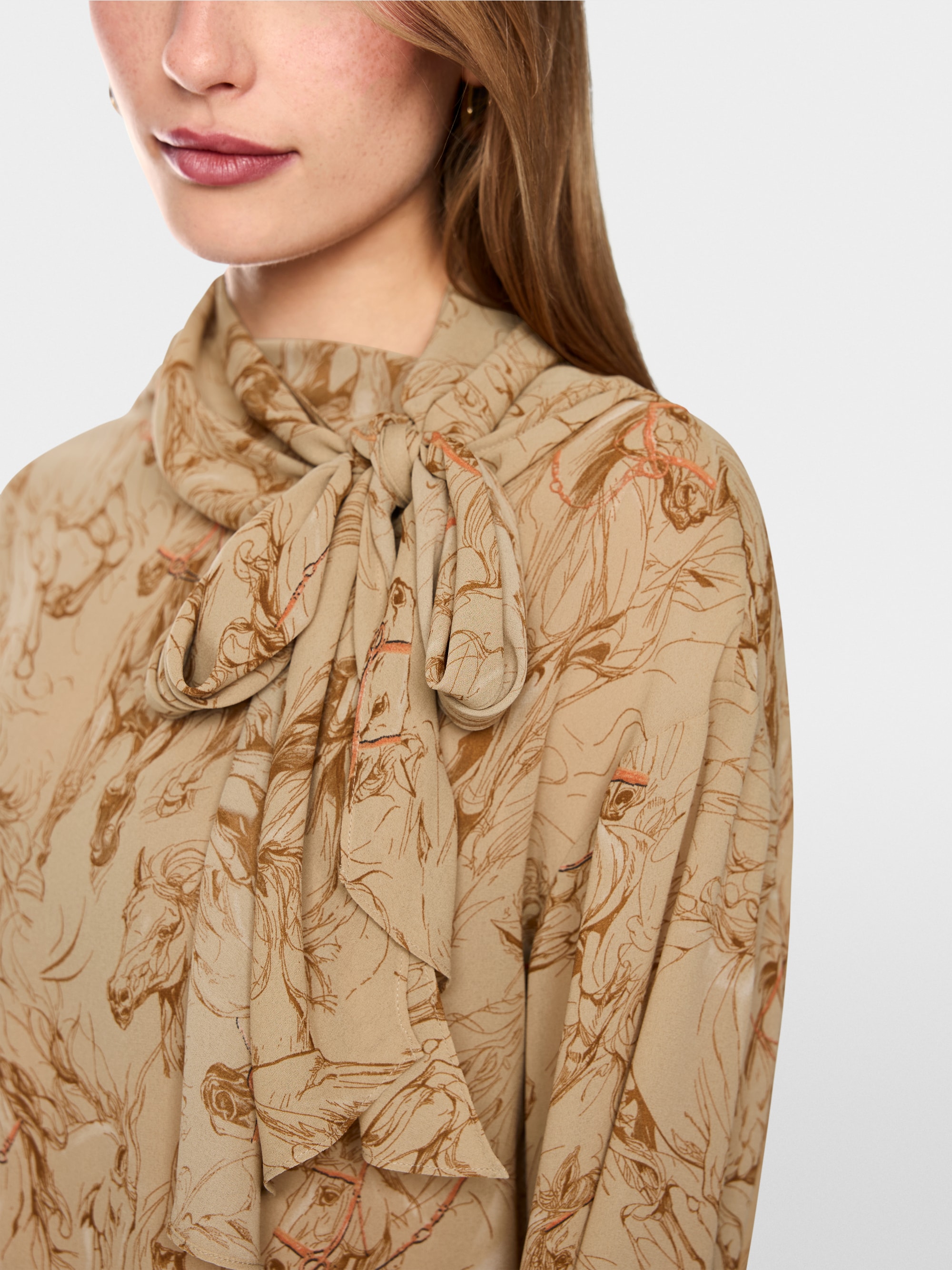 Bow blouse with horse print