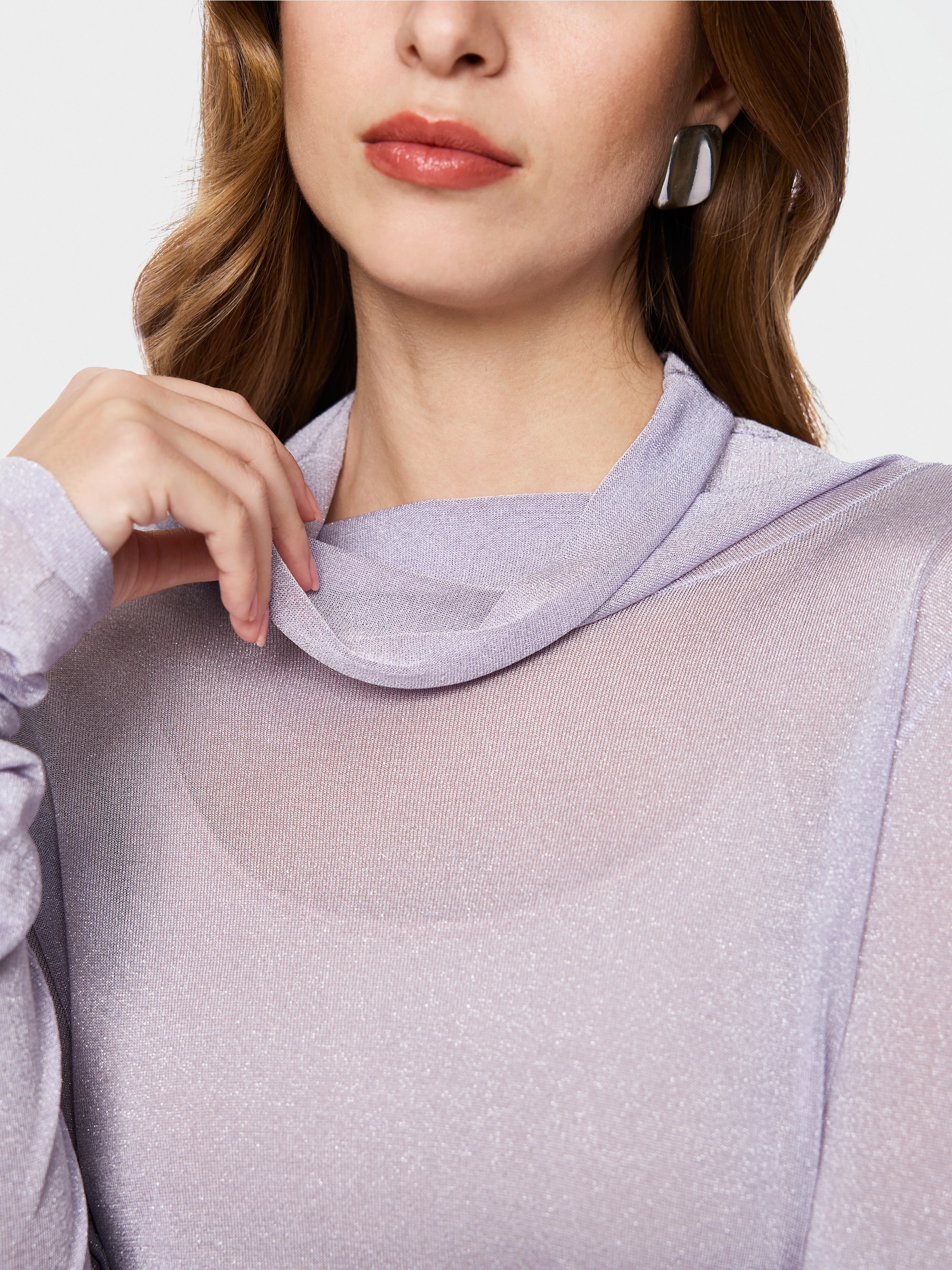 Turtleneck top with sheen and ruffles