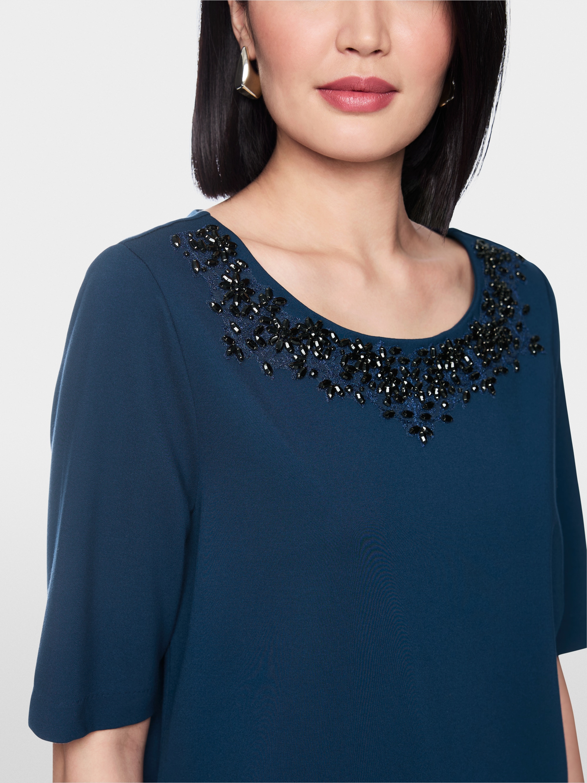 Shirt with opulent embellishment