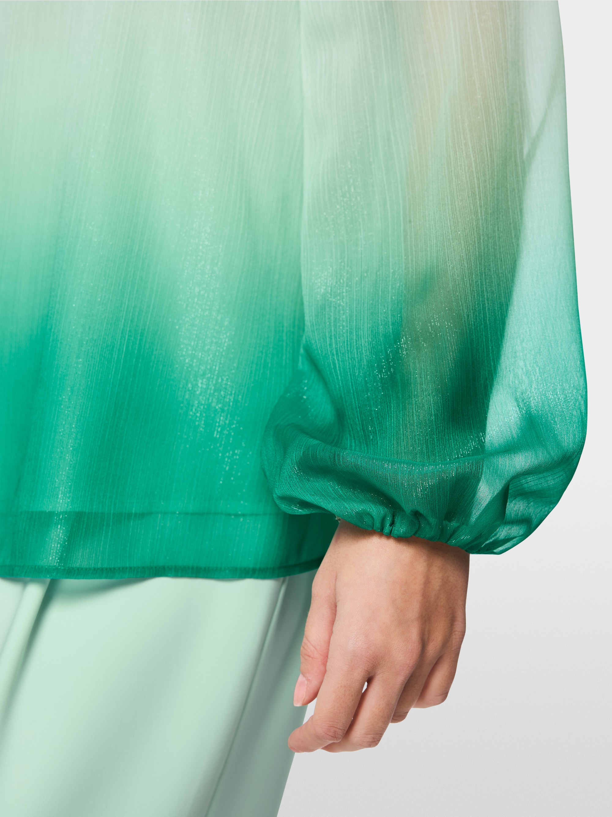 Tunic blouse with elasticated cuffs