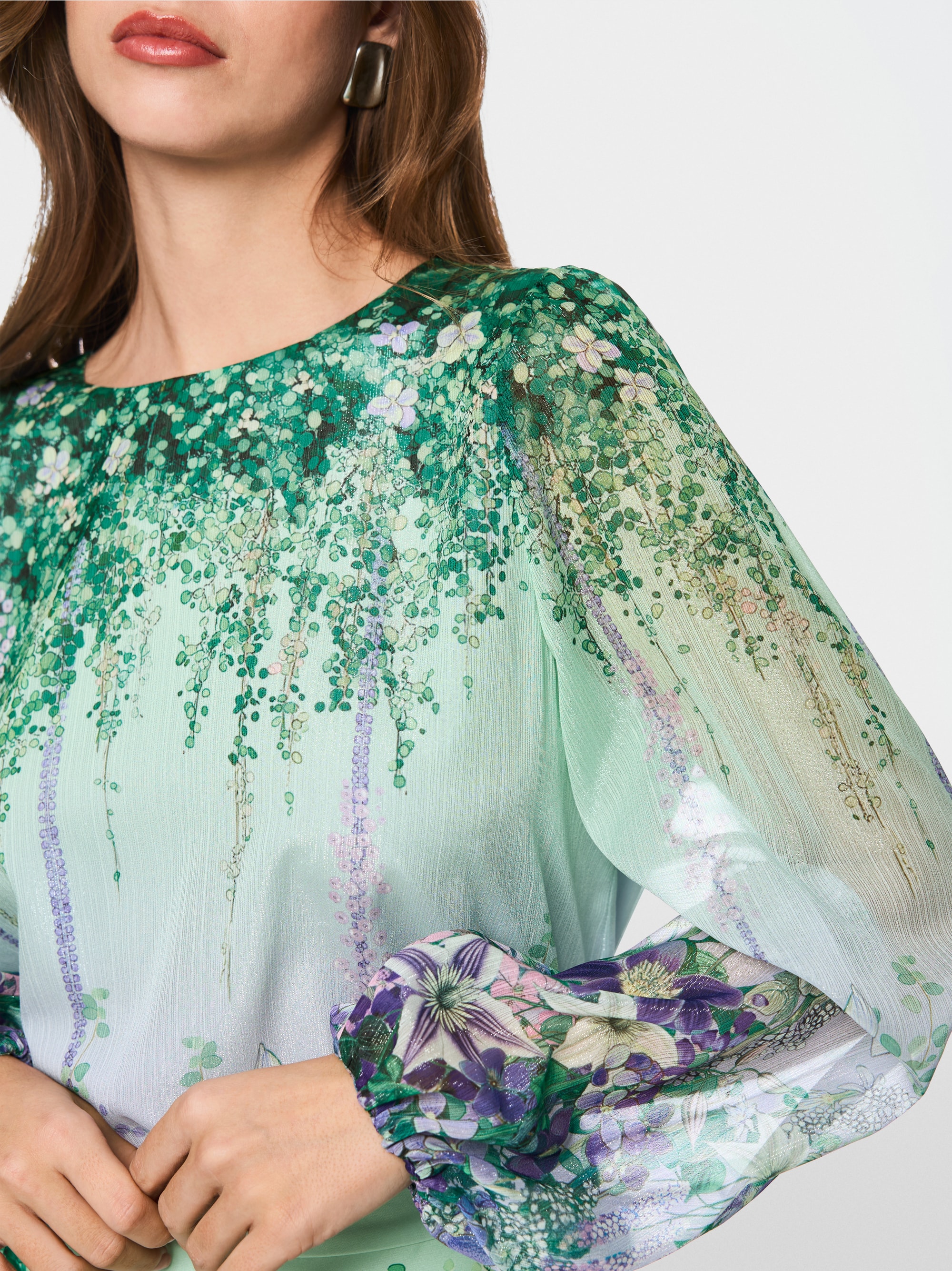 Tunic blouse with elasticated cuffs