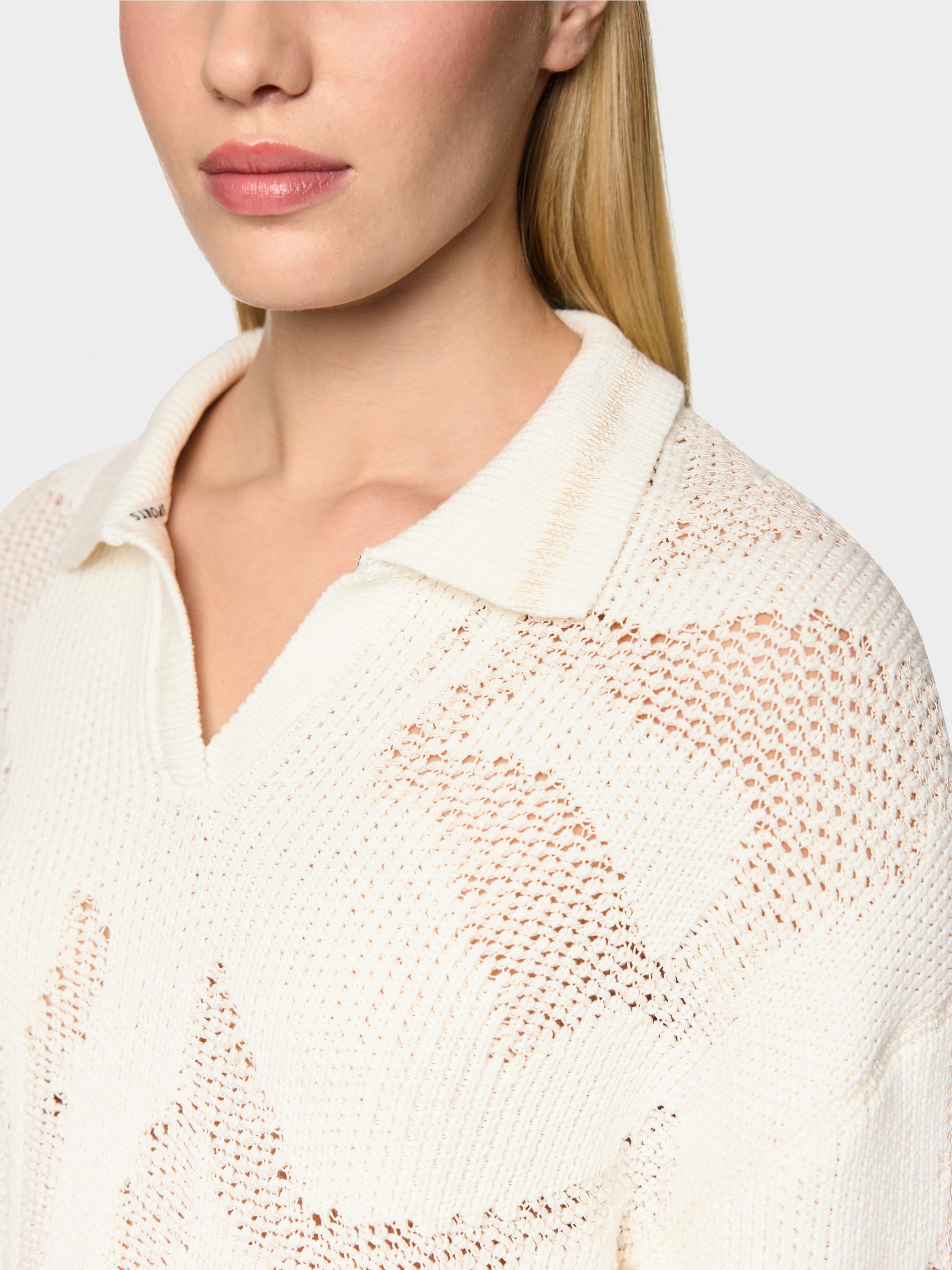 ‘Knitted in Germany’ V-neck jumper