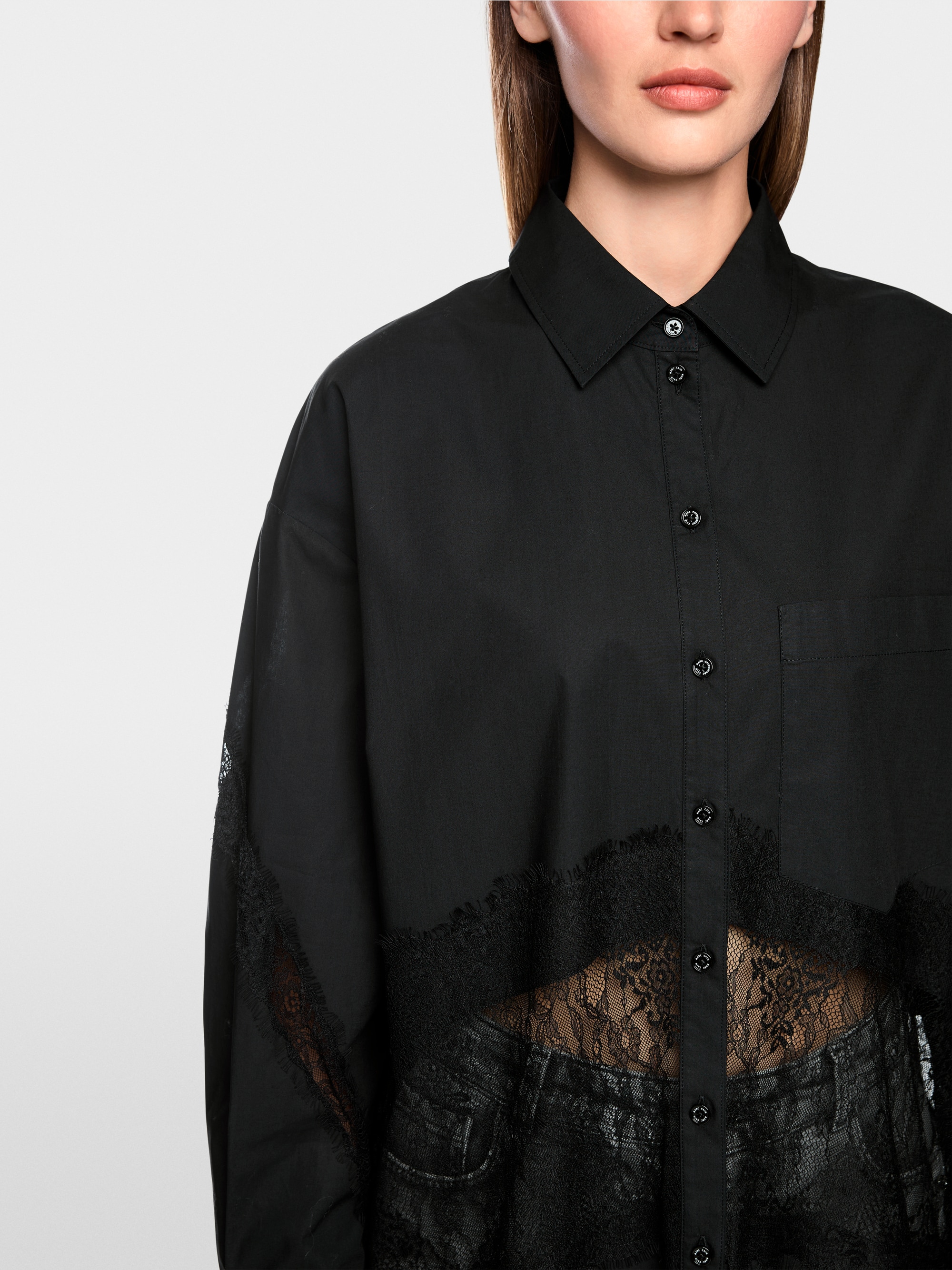 Blouse with lace inserts