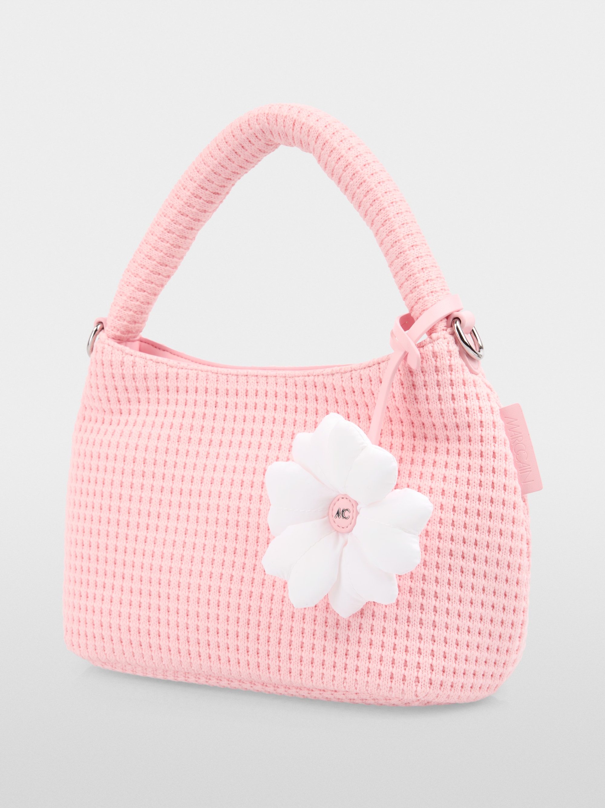 Handbag with knitted surface