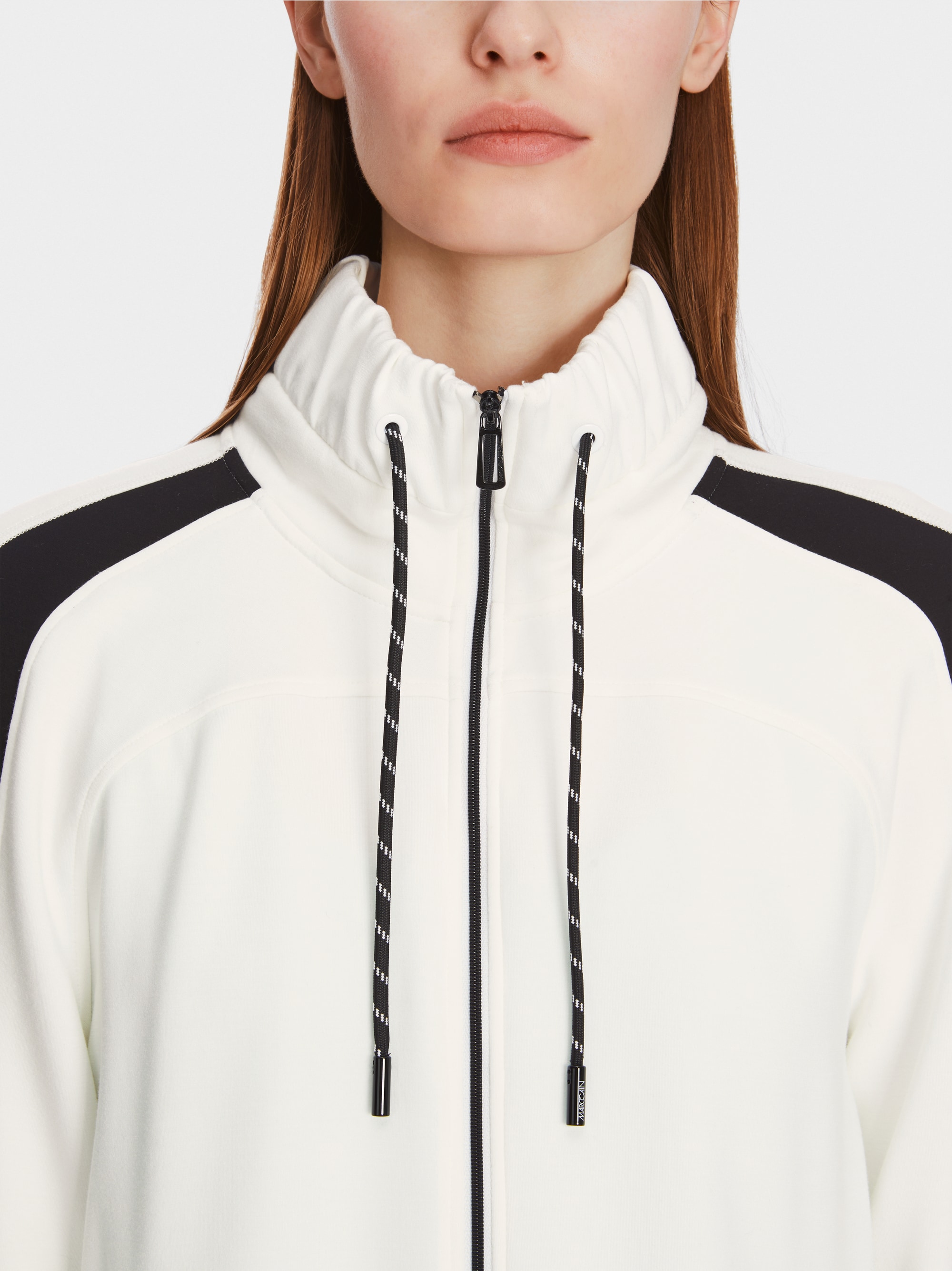 Veste zippée avec col à volants