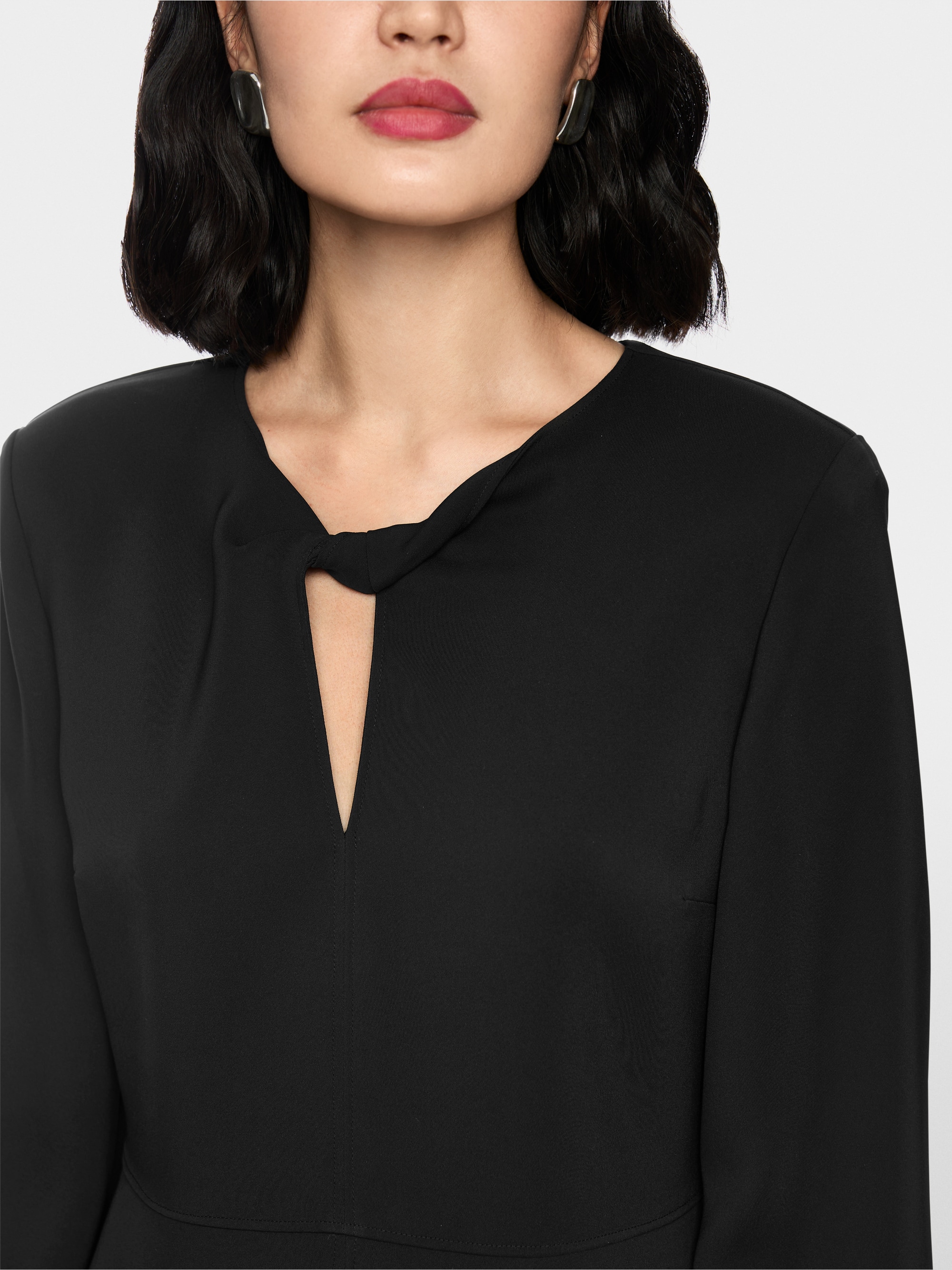 Elegante jurk met overslagdetail