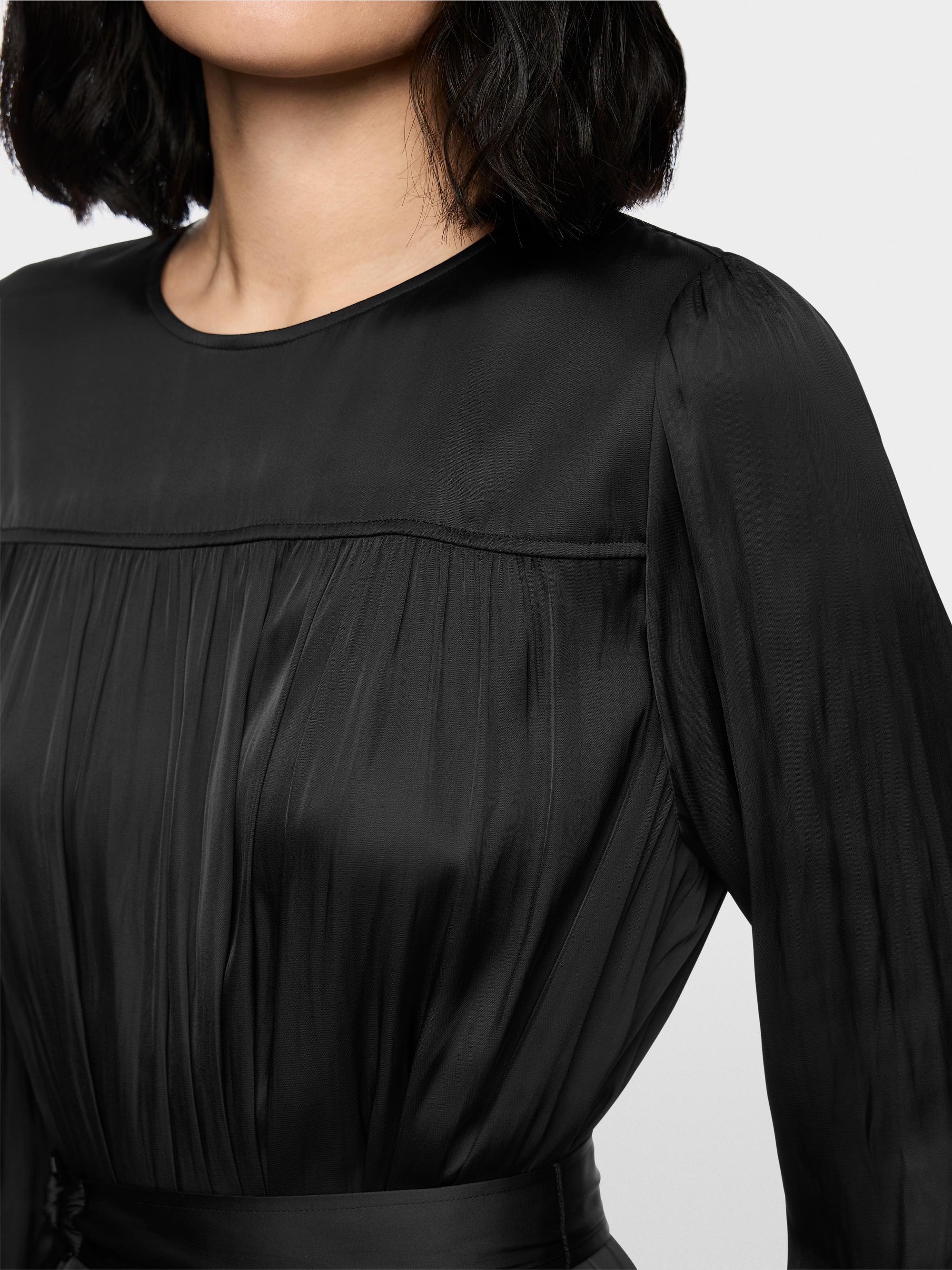 Mini-jurk met volants en riem