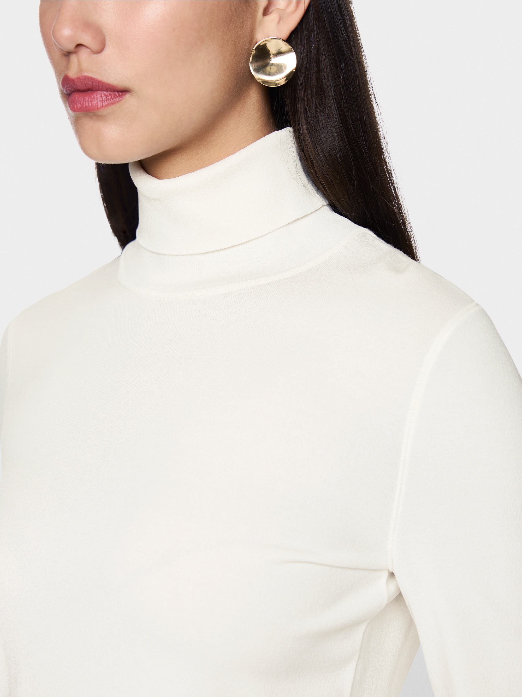 Pull à col roulé tricoté en Allemagne
