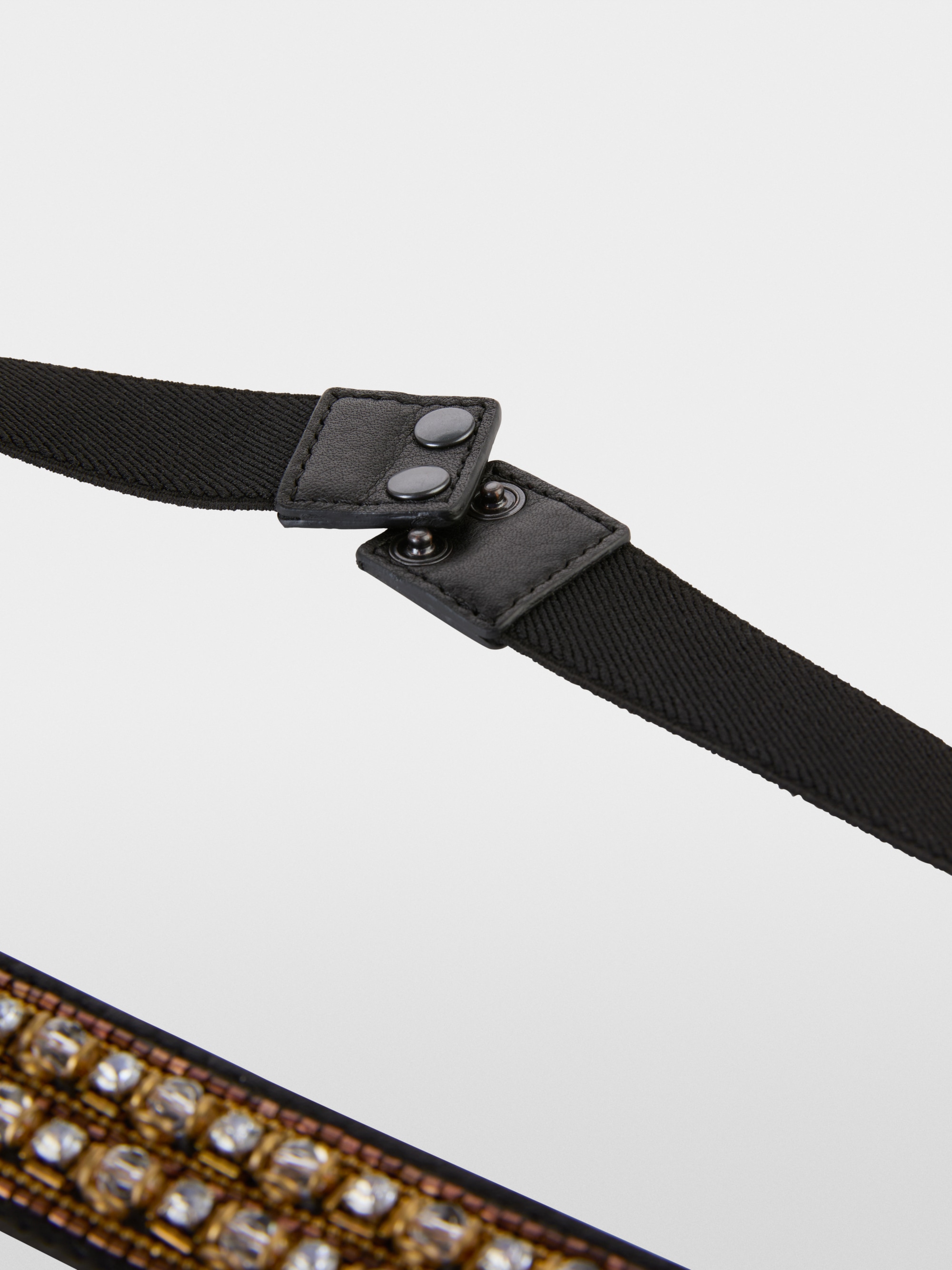 Leren riem met pareldetails
