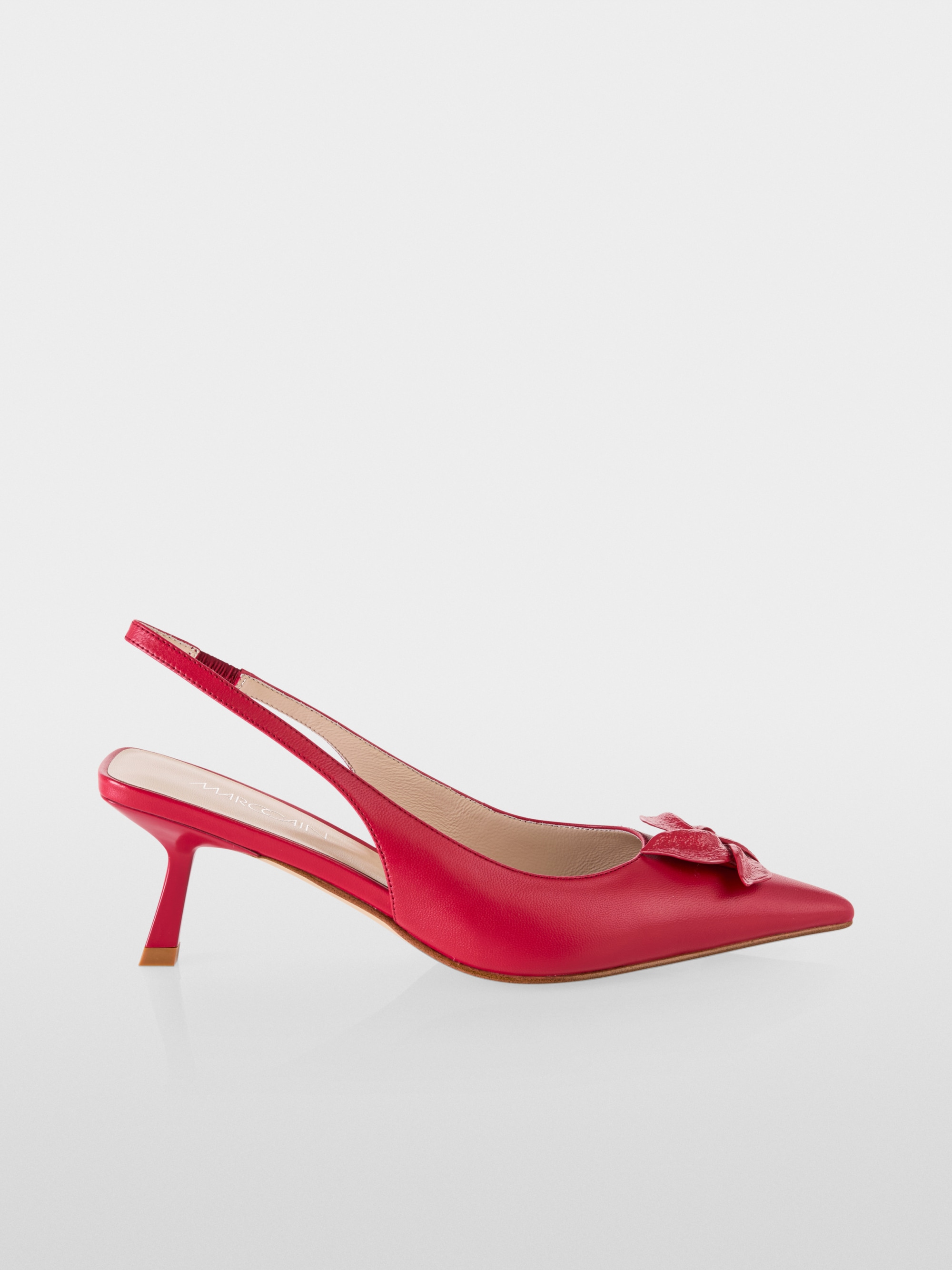 Slingback pumps in calf leather