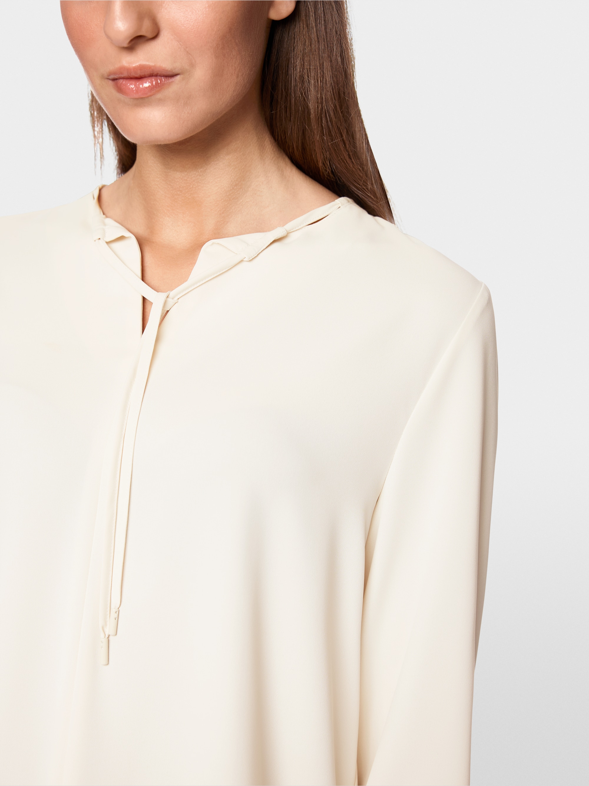 Flowing slip-on blouse with bow