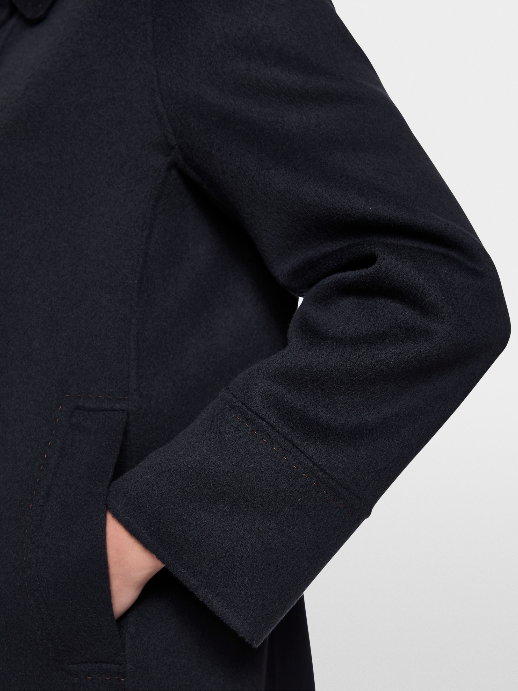 Wool coat with decorative stitching