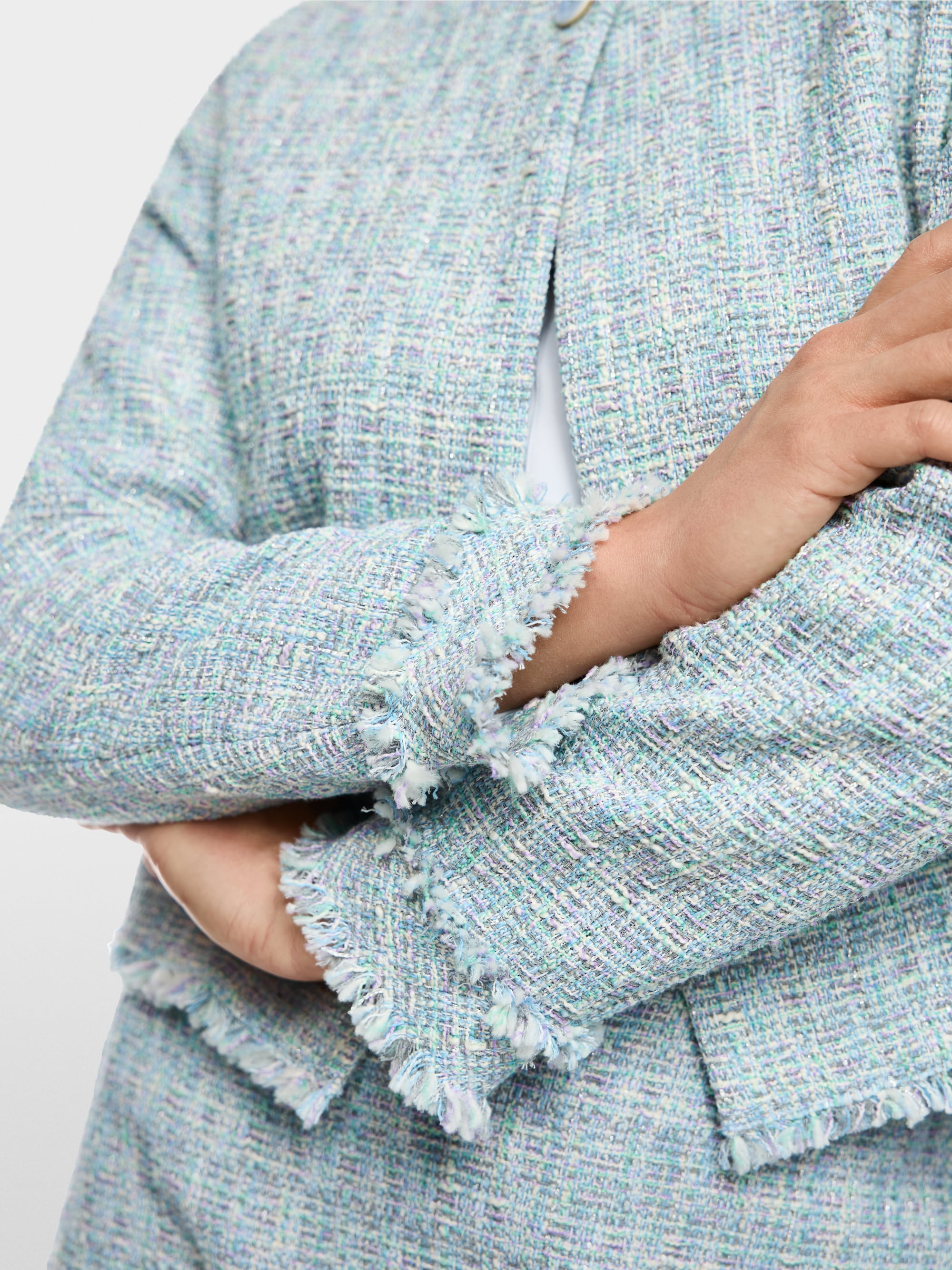 Veste bouclée à franges