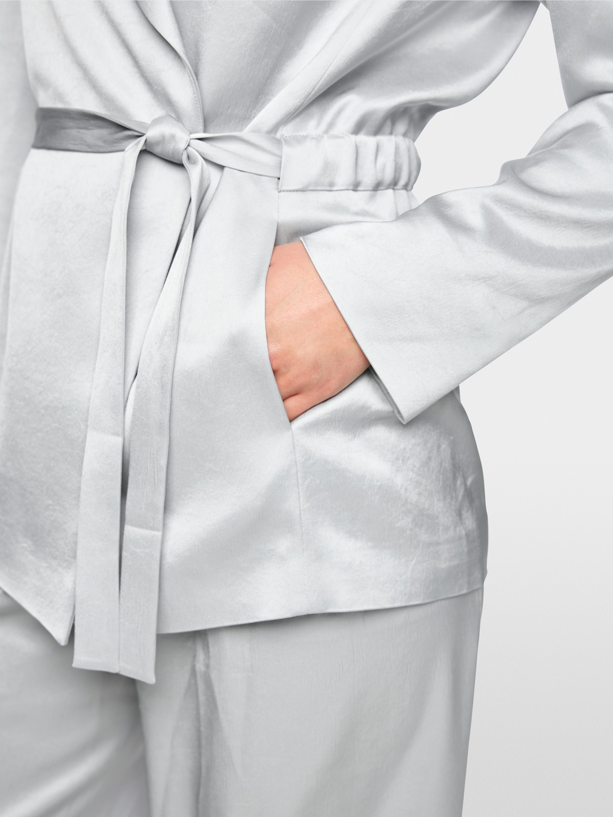 Elegant wrap blazer with waist belt