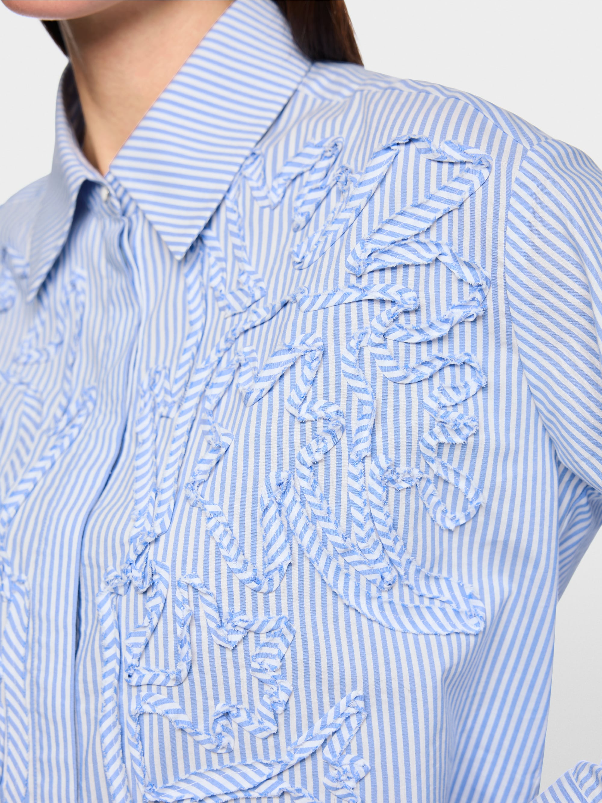 Striped blouse with floral details