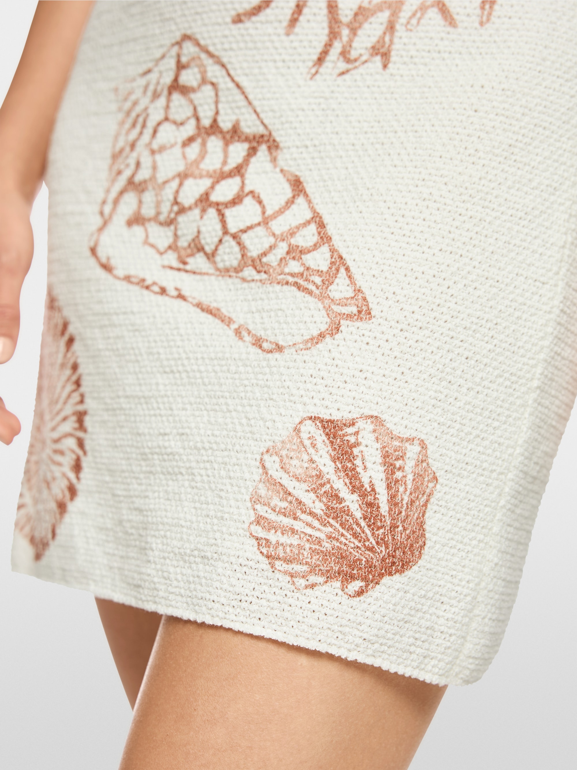 ‘Knitted in Germany’ shells print skirt