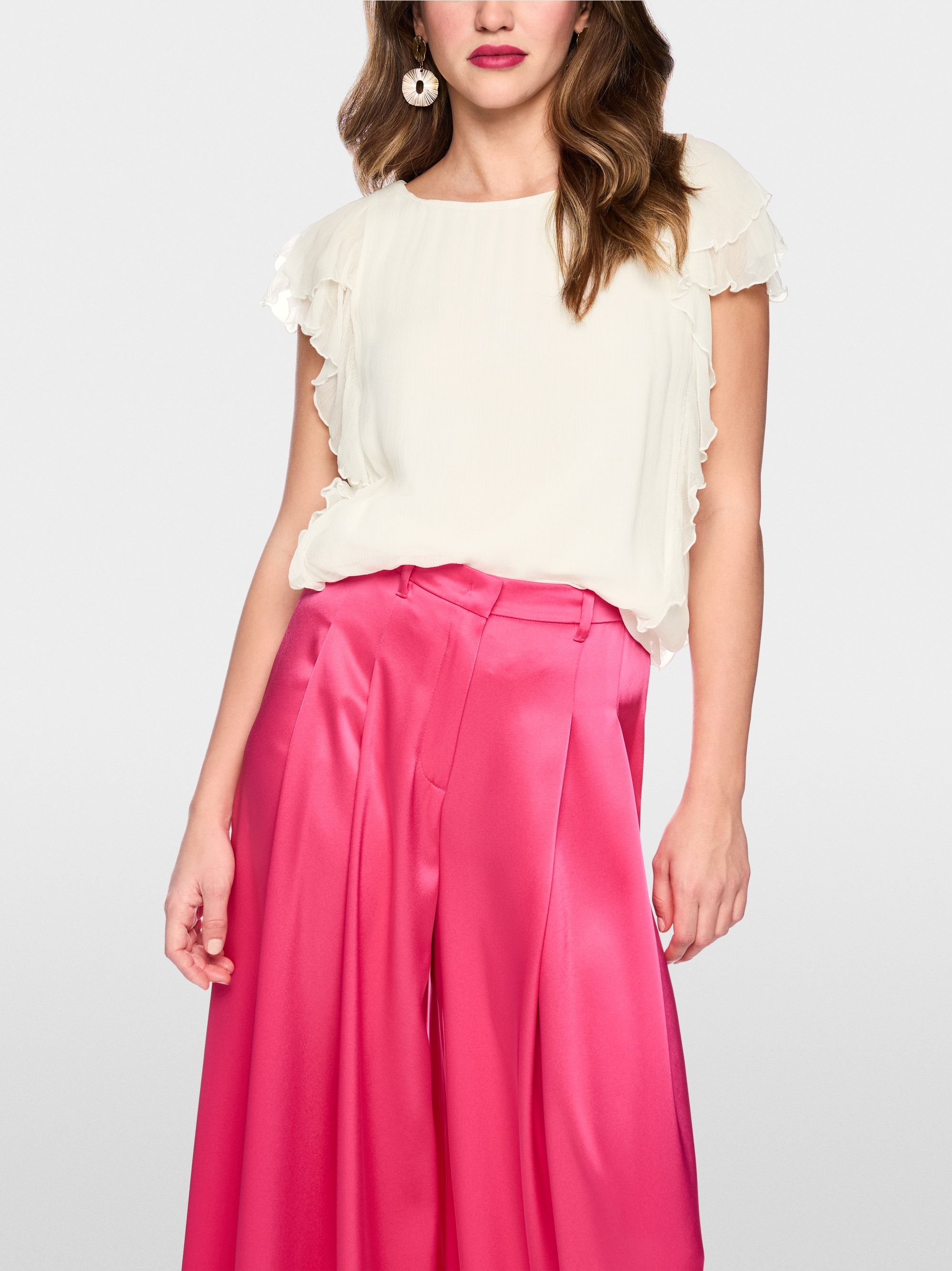 Delicate blouse with ruffles