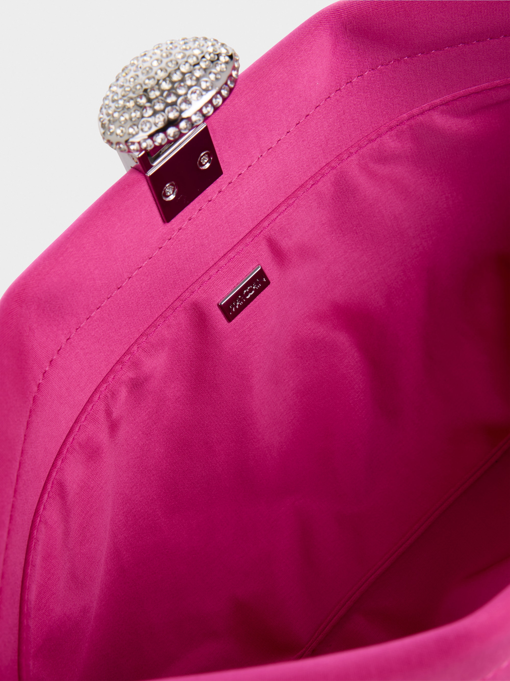 Satin clutch with crystal clasp