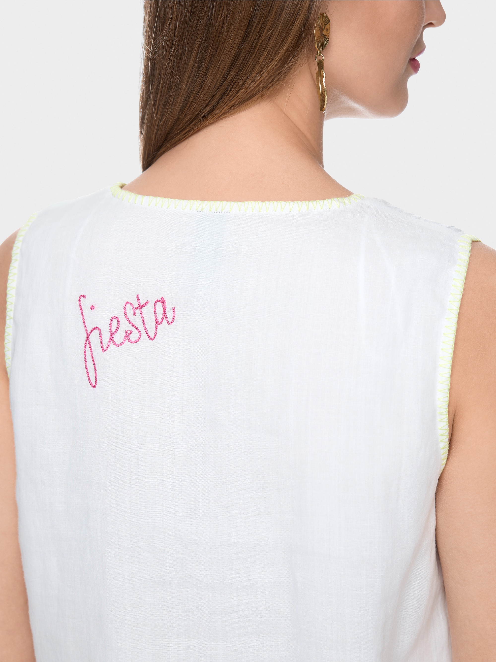 Loose top with embroidered patches