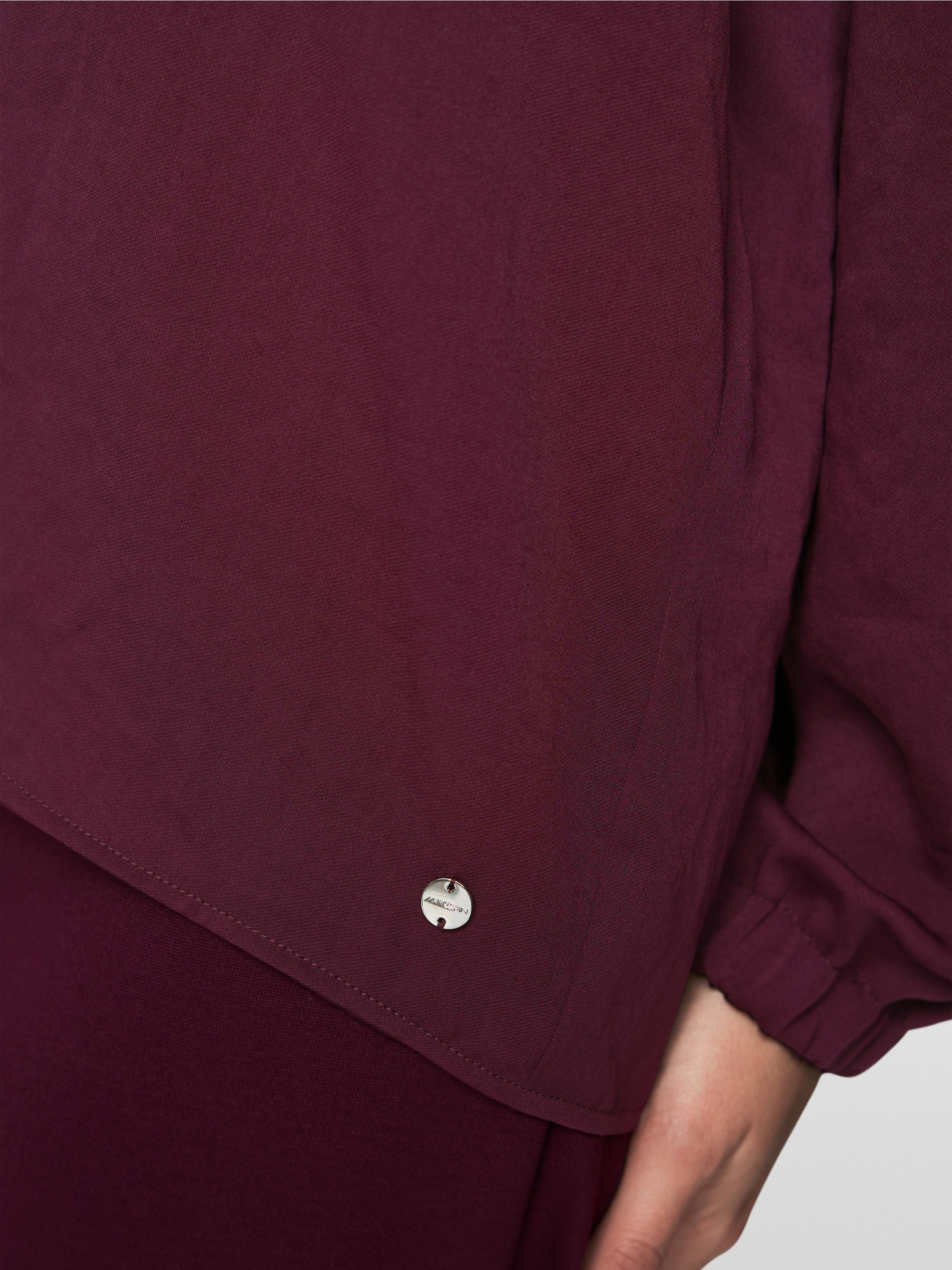 Loose-fitting blouse with V-neck