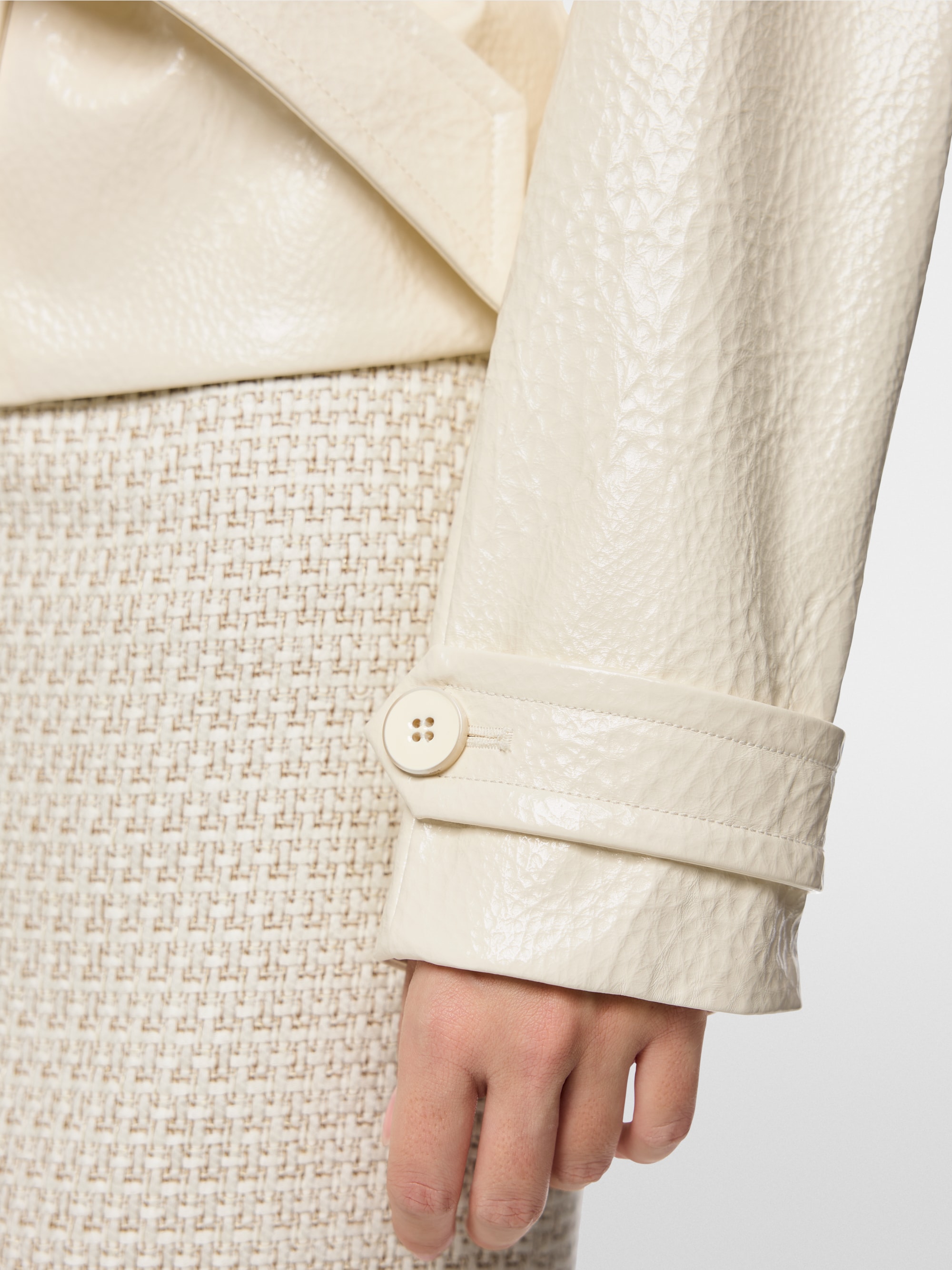 Short trench jacket with patent finish
